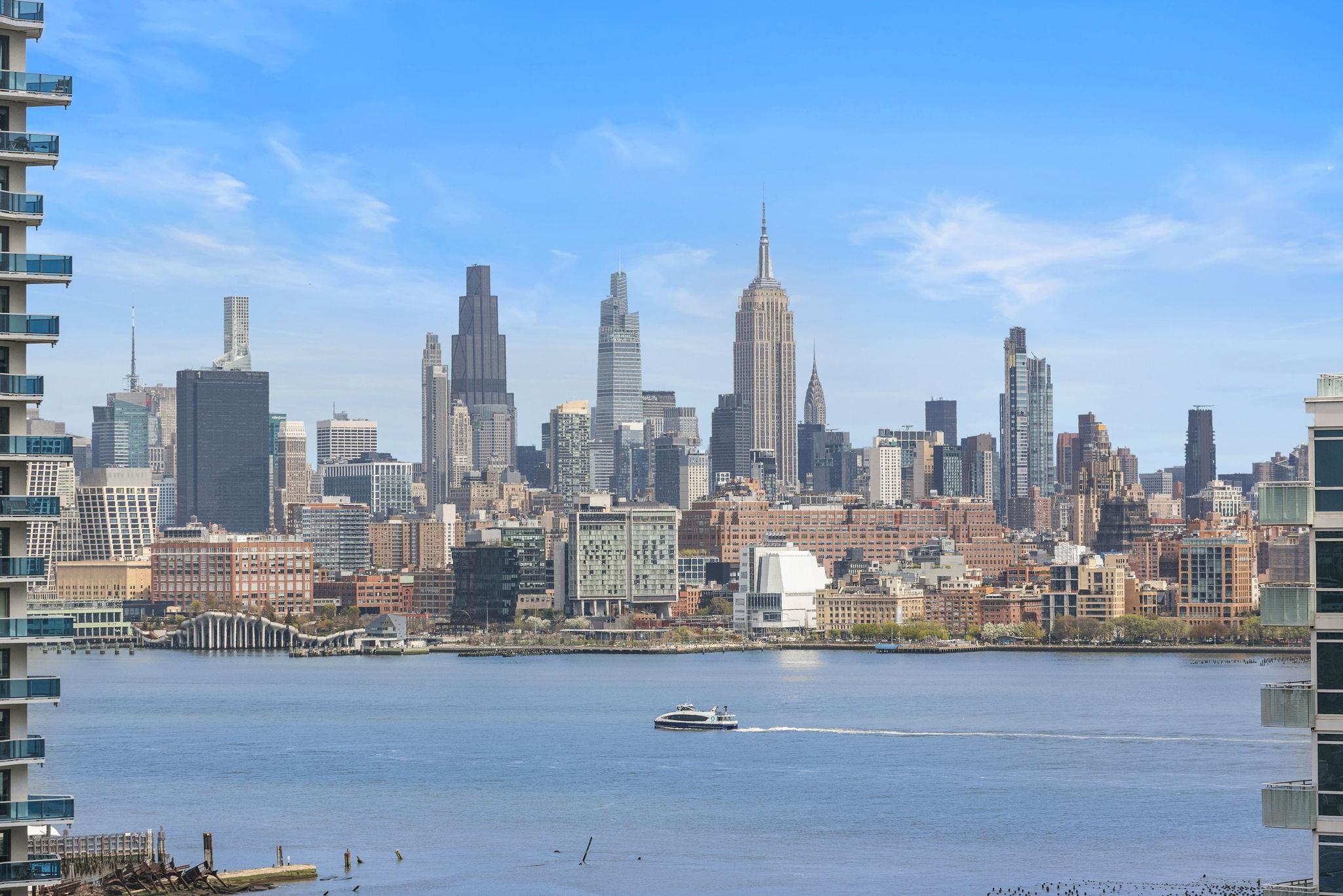 75 Park Lane South, Unit 1607 Jersey City, NJ 07310 - Photo 14 of 20 a view of a city with tall buildings