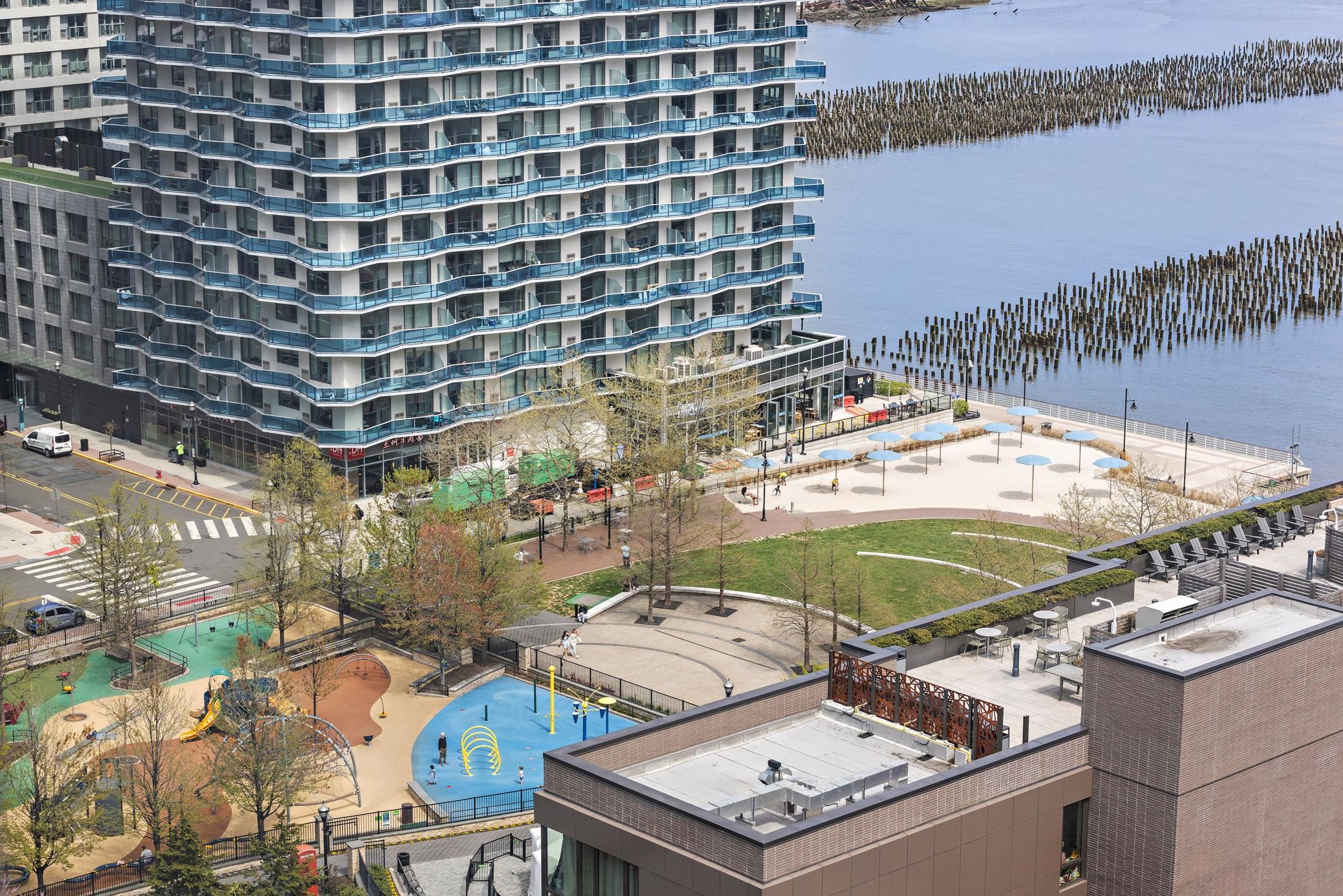 75 Park Lane South, Unit 1607 Jersey City, NJ 07310 - Photo 16 of 20 a view of a balcony with an outdoor space