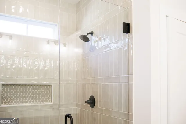 a bathroom with a sink and mirror