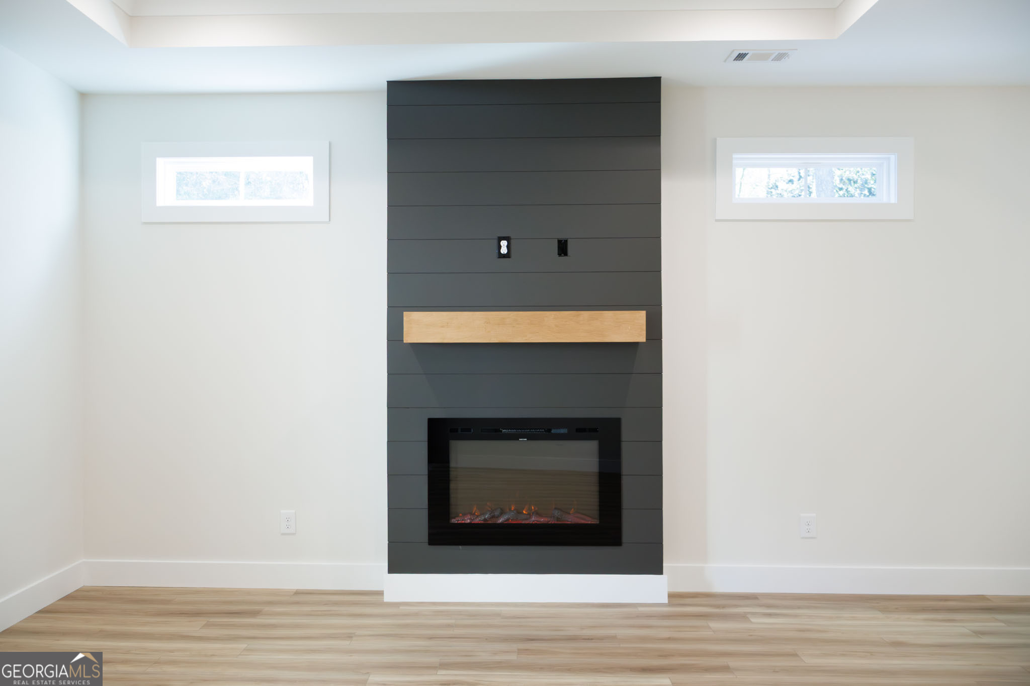 903 Massee Lane Perry, GA 31069 - Photo 9 of 26 a view of a livingroom with wooden floor