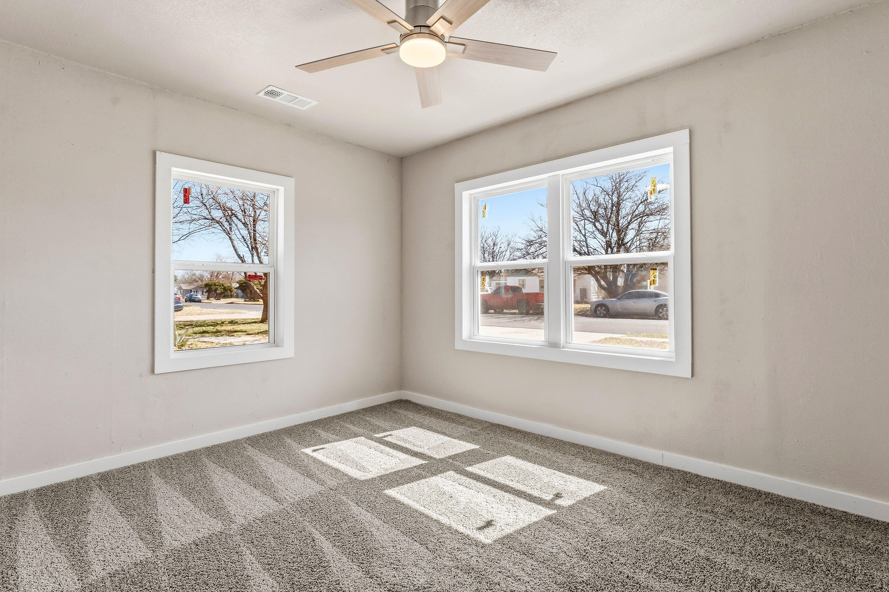 2814 40th Street Lubbock, TX 79413 - Photo 5 of 10 a view of an empty room with a window