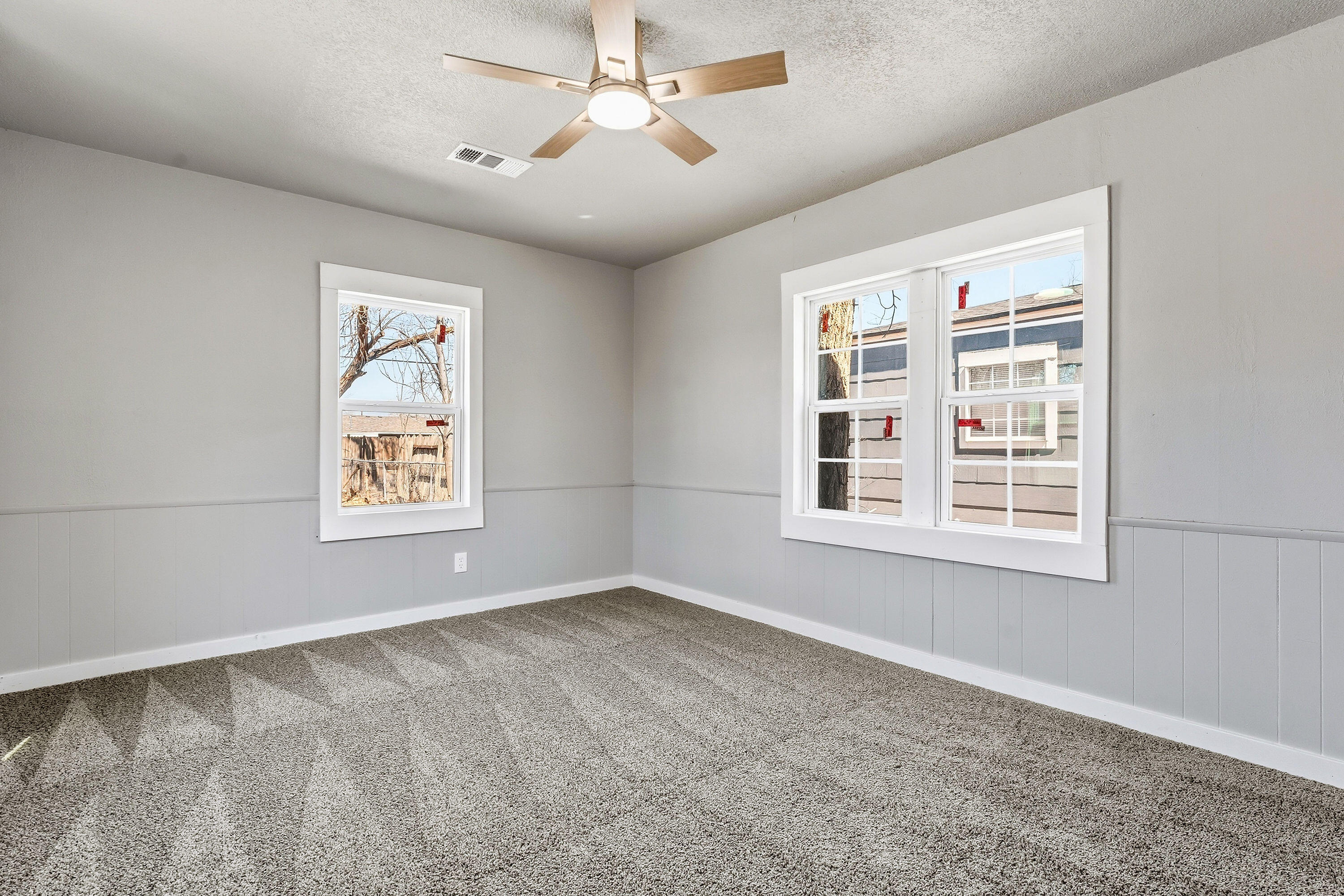 2814 40th Street Lubbock, TX 79413 - Photo 7 of 10 a view of an empty room with a window