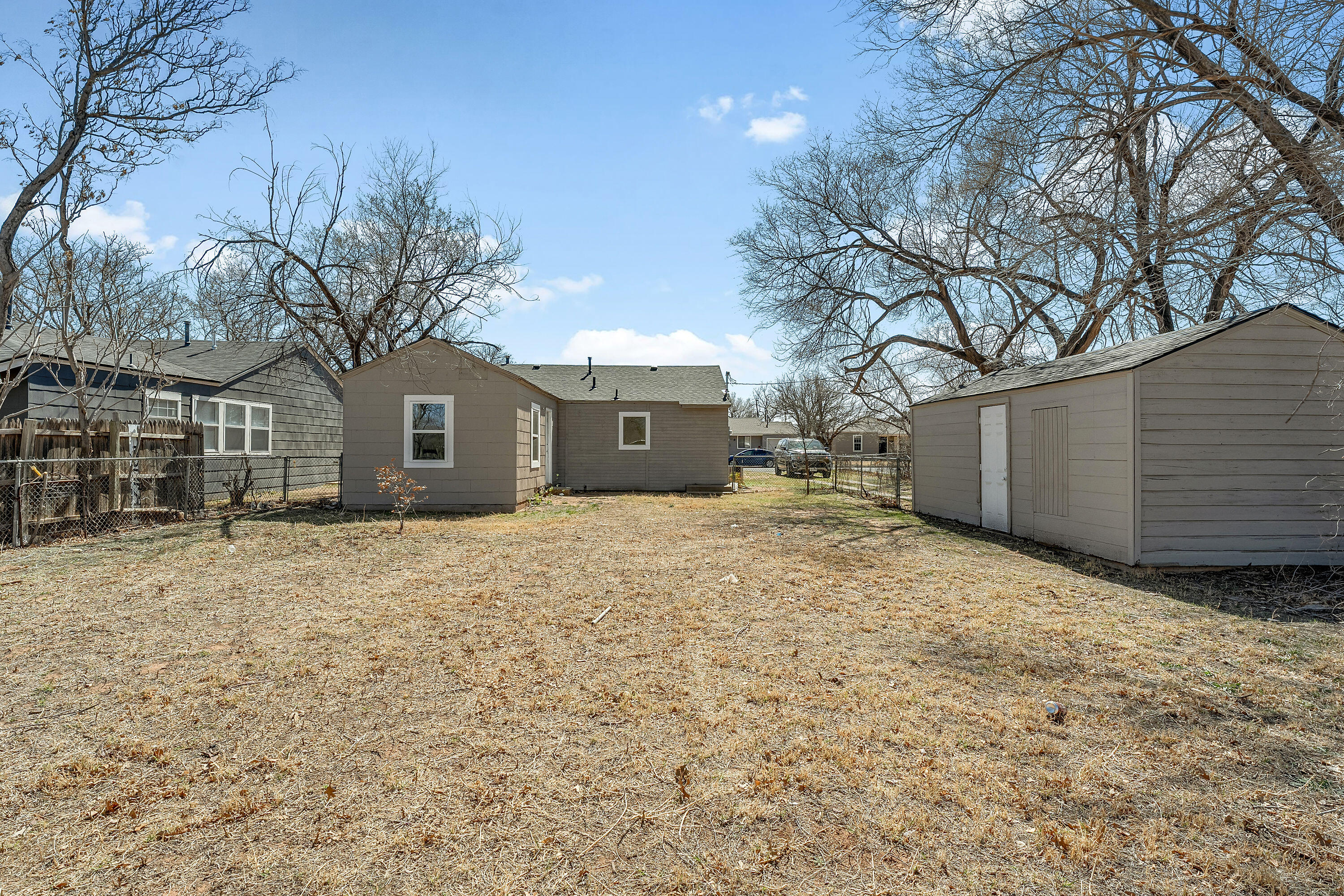 2814 40th Street Lubbock, TX 79413 - Photo 10 of 10 a house with trees in front of it