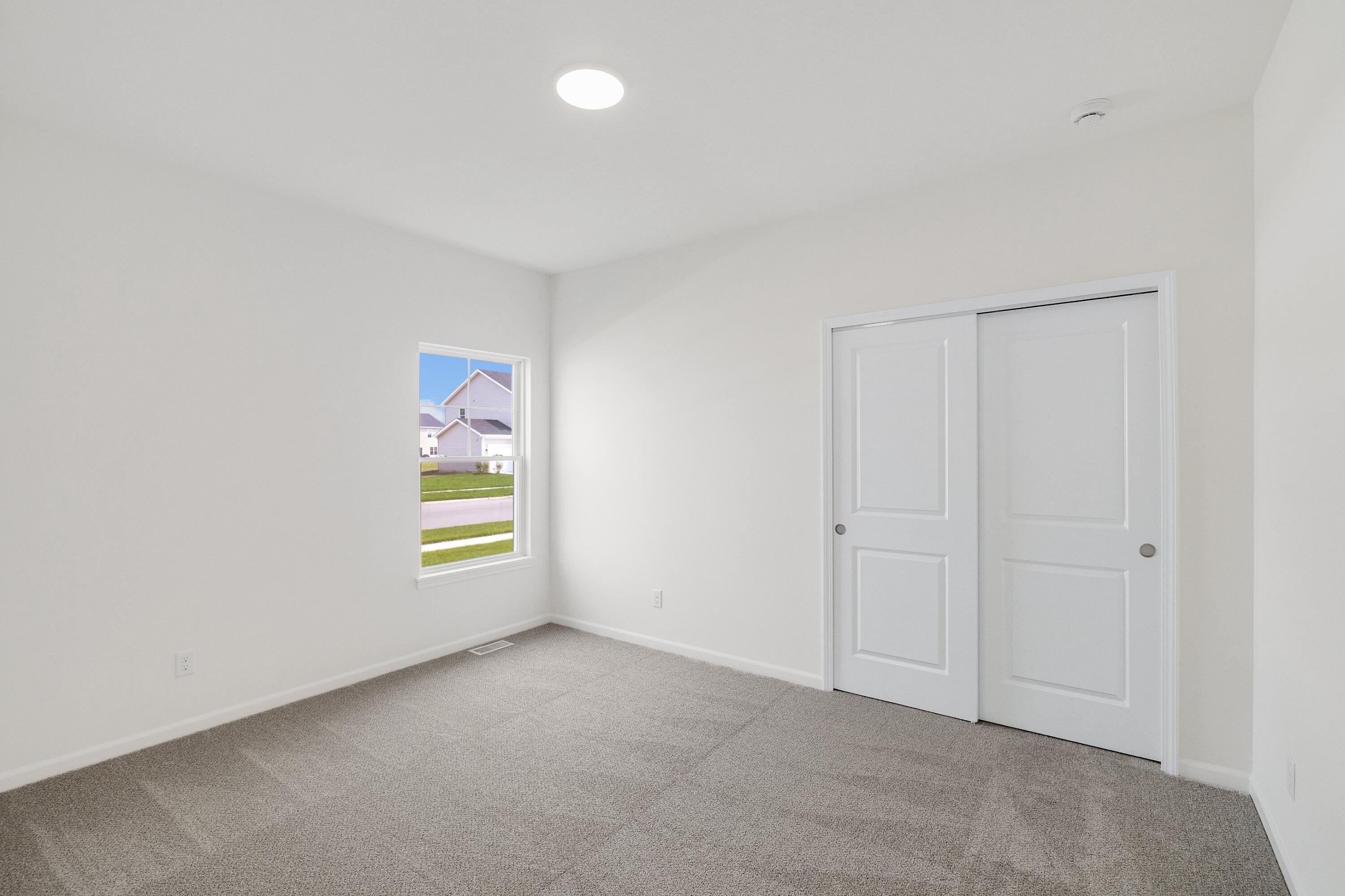 6821 Tucson Road Schererville, IN 46375 - Photo 15 of 24 an empty room with windows