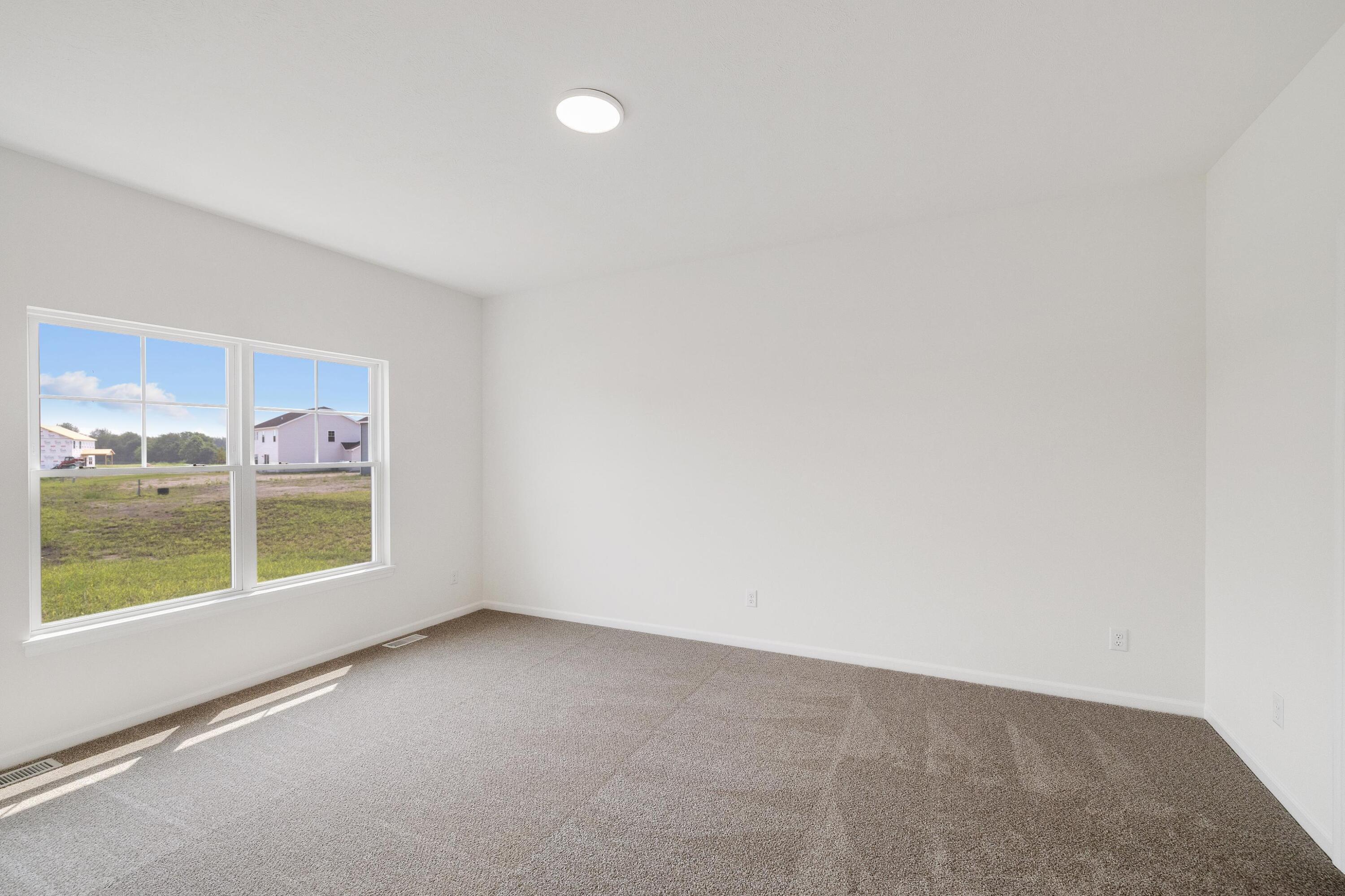 6821 Tucson Road Schererville, IN 46375 - Photo 18 of 24 a view of an empty room with a window