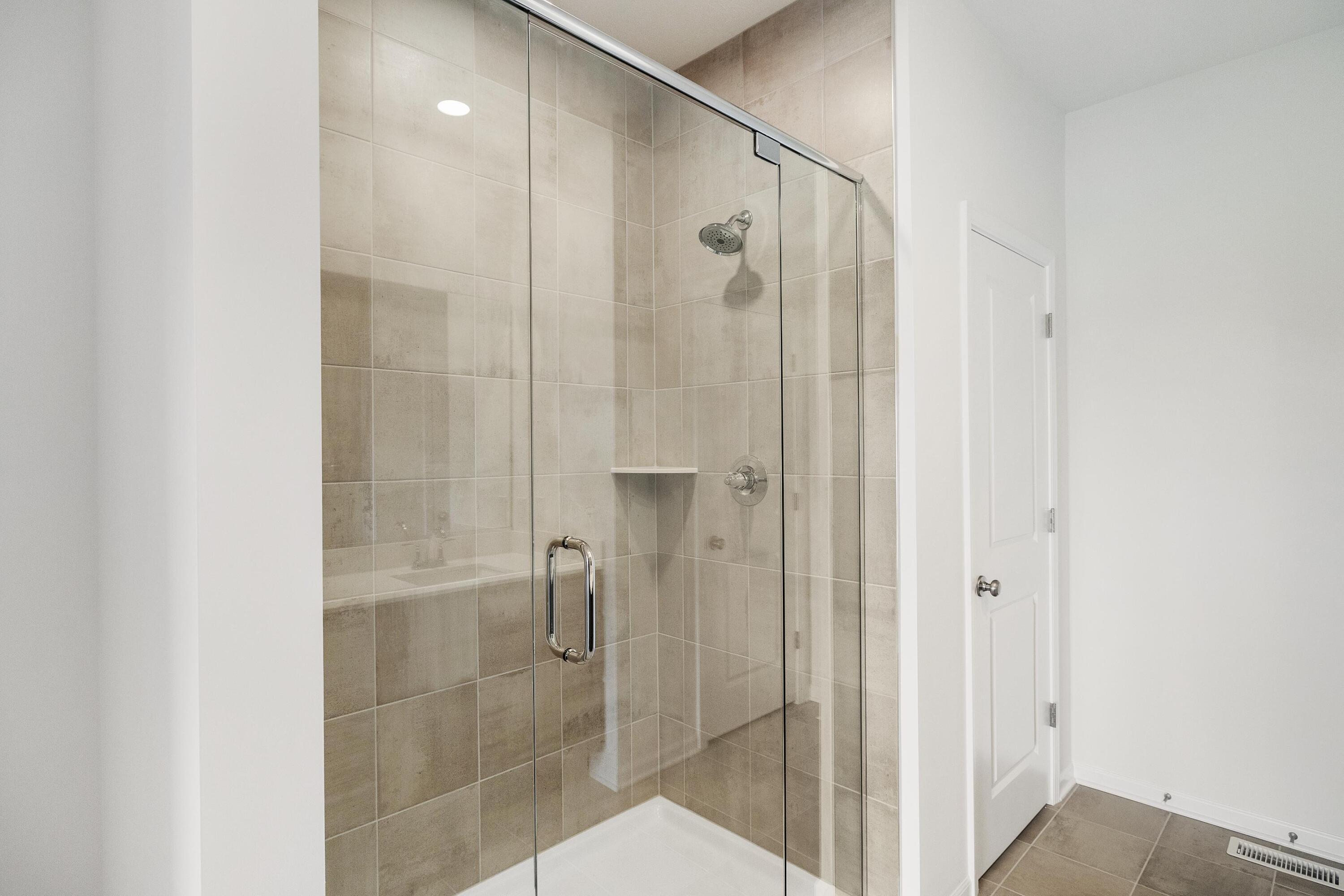 6821 Tucson Road Schererville, IN 46375 - Photo 21 of 24 a bathroom with a shower and a sink