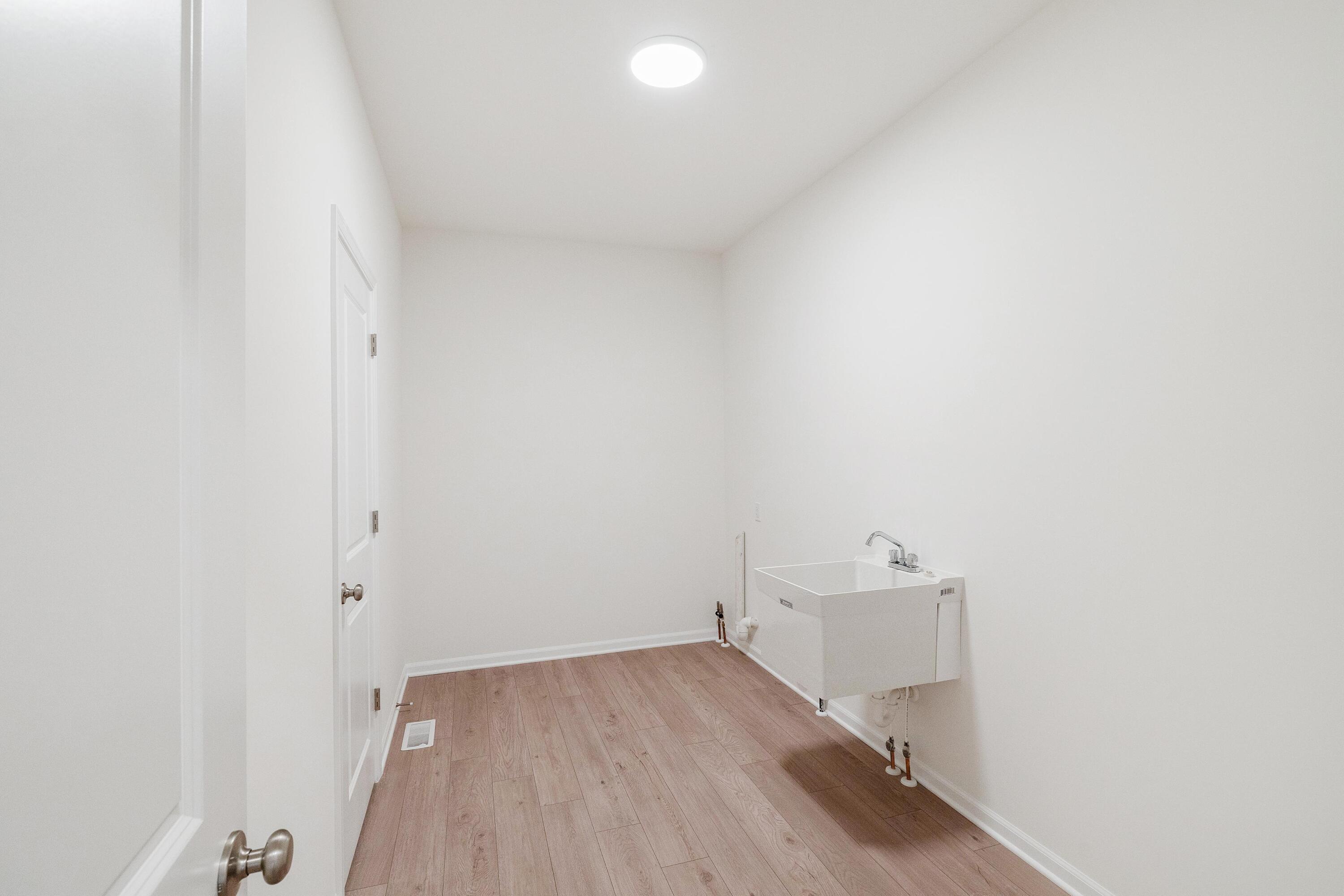 6821 Tucson Road Schererville, IN 46375 - Photo 23 of 24 a view of a room with wooden floor