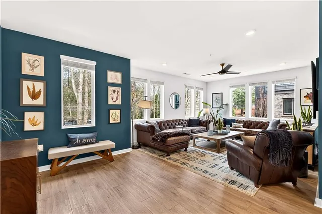 a living room with furniture and a window