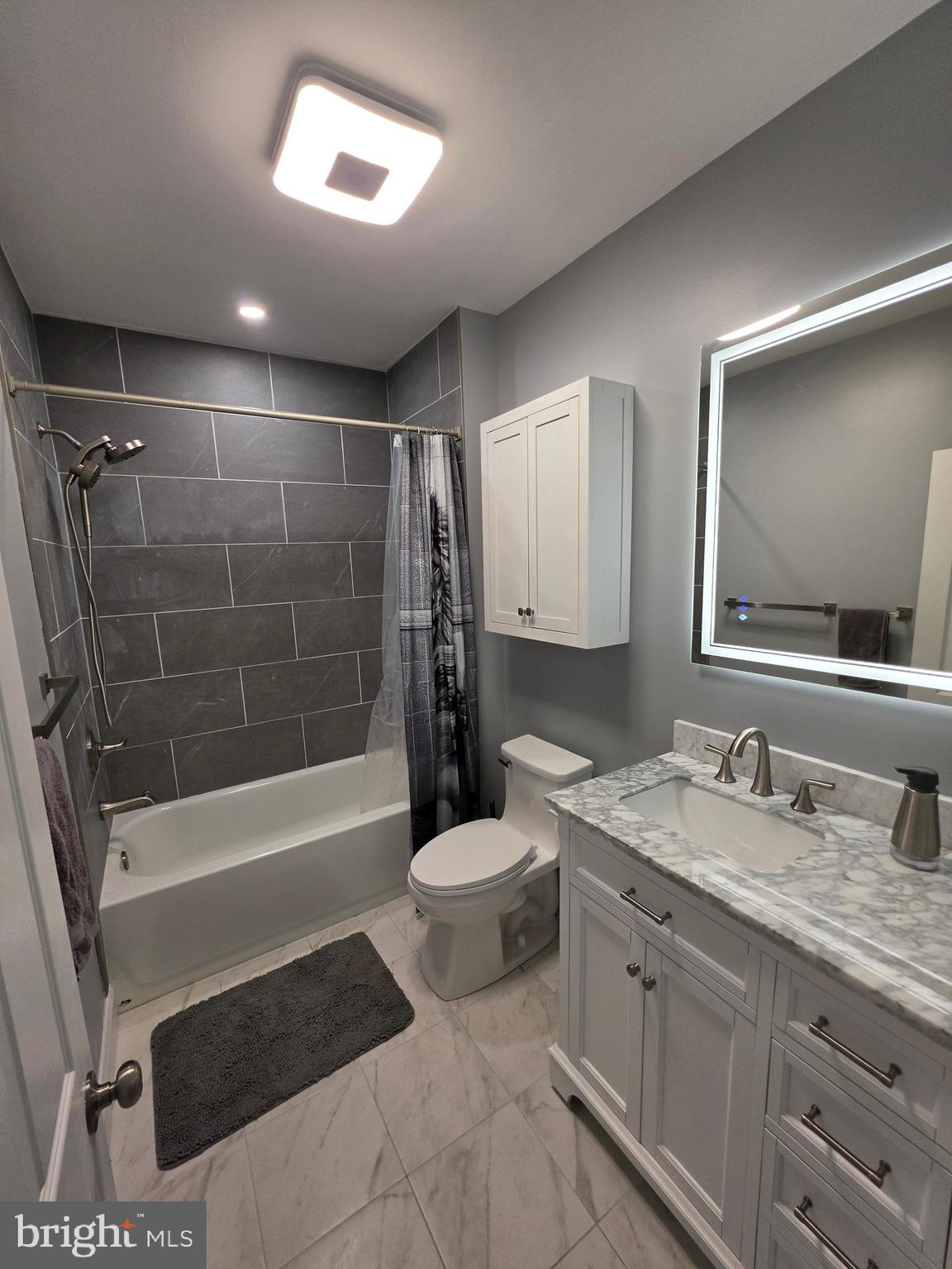 142 New Road Horsham, PA 19044 - Photo 14 of 38 a bathroom with a double vanity sink toilet and shower