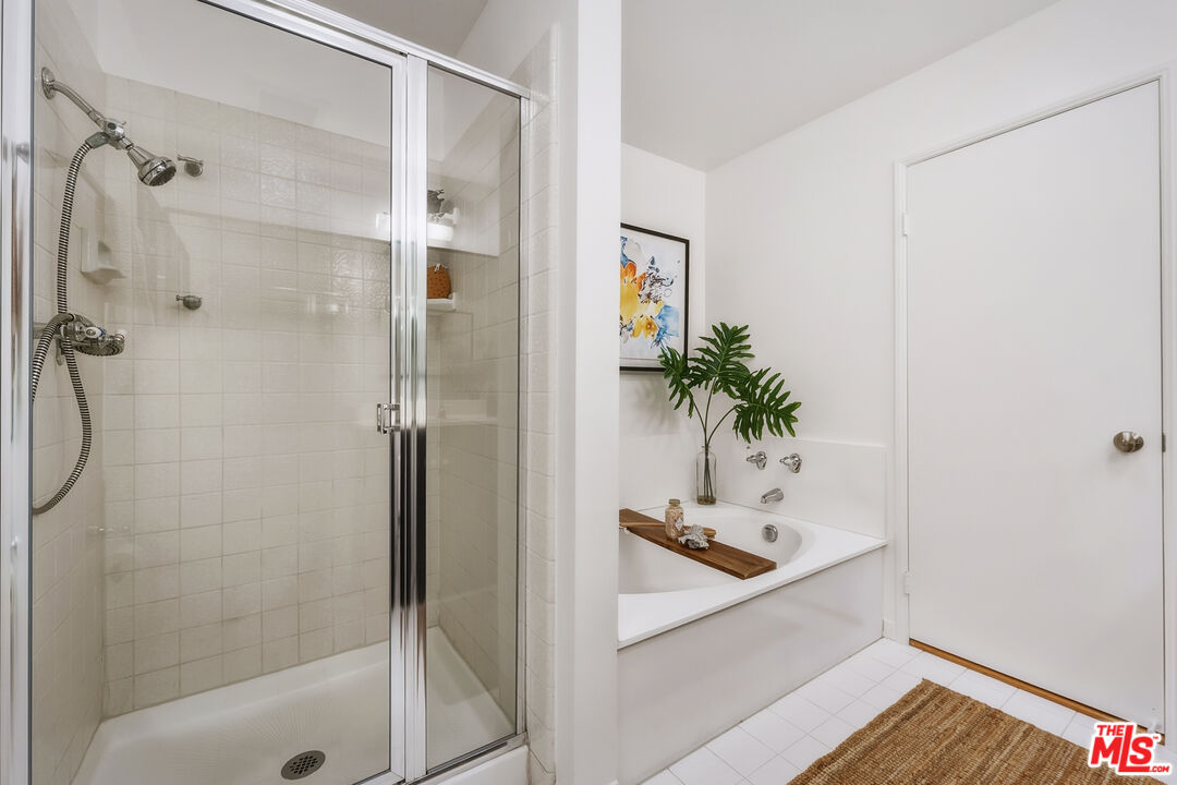 311 Bora Bora Way, Unit 315 Marina del Rey, CA 90292 - Photo 17 of 34 a bathroom with a tub shower and sink