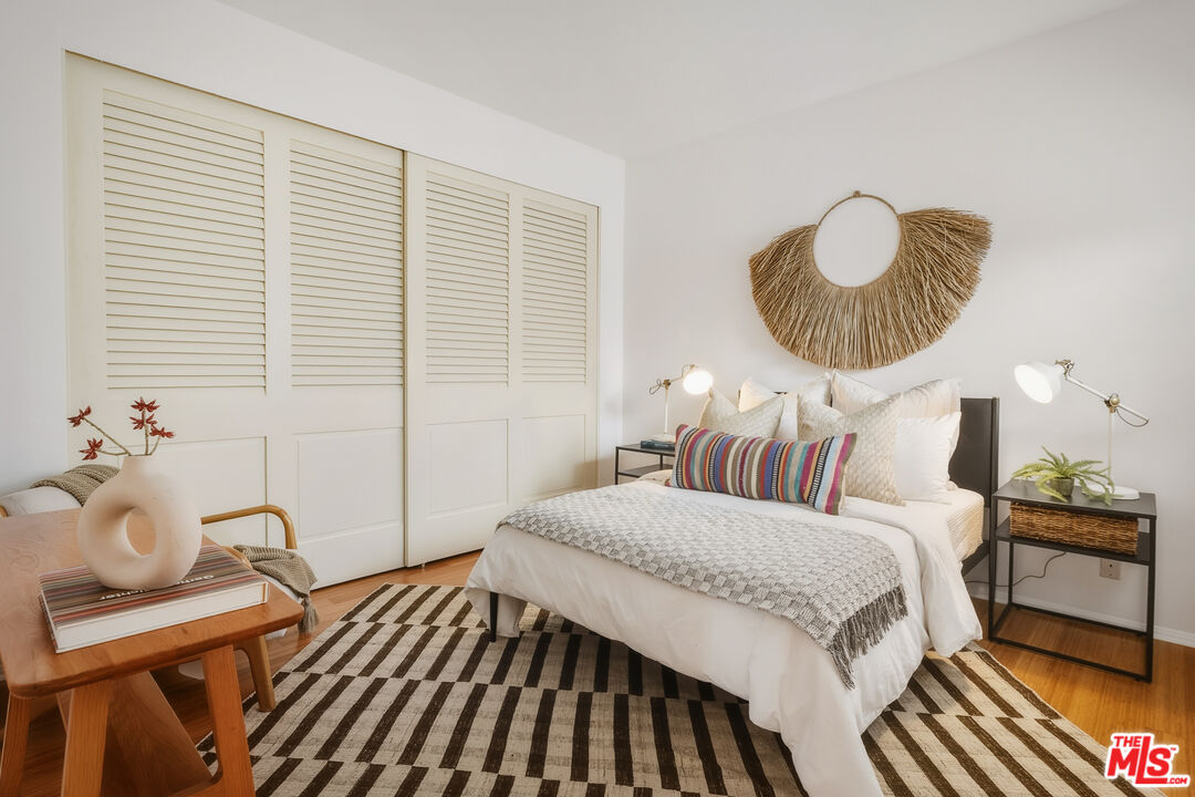 311 Bora Bora Way, Unit 315 Marina del Rey, CA 90292 - Photo 18 of 34 a bedroom with a bed and window