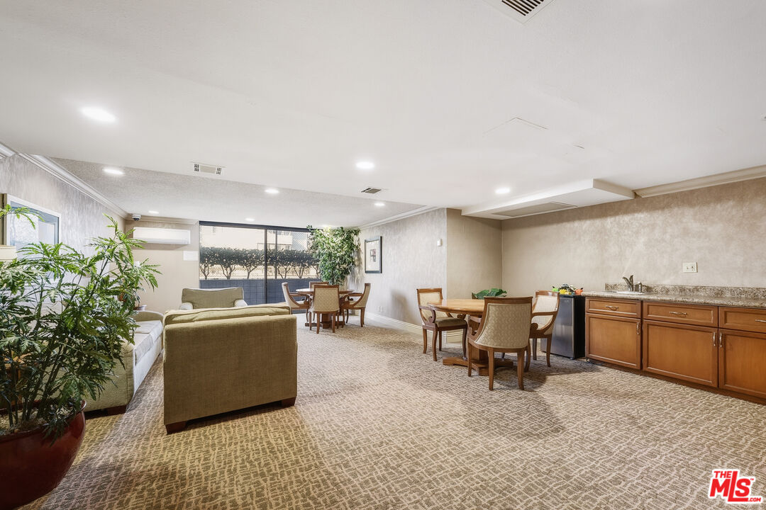 311 Bora Bora Way, Unit 315 Marina del Rey, CA 90292 - Photo 25 of 34 a living room with furniture a window and kitchen view