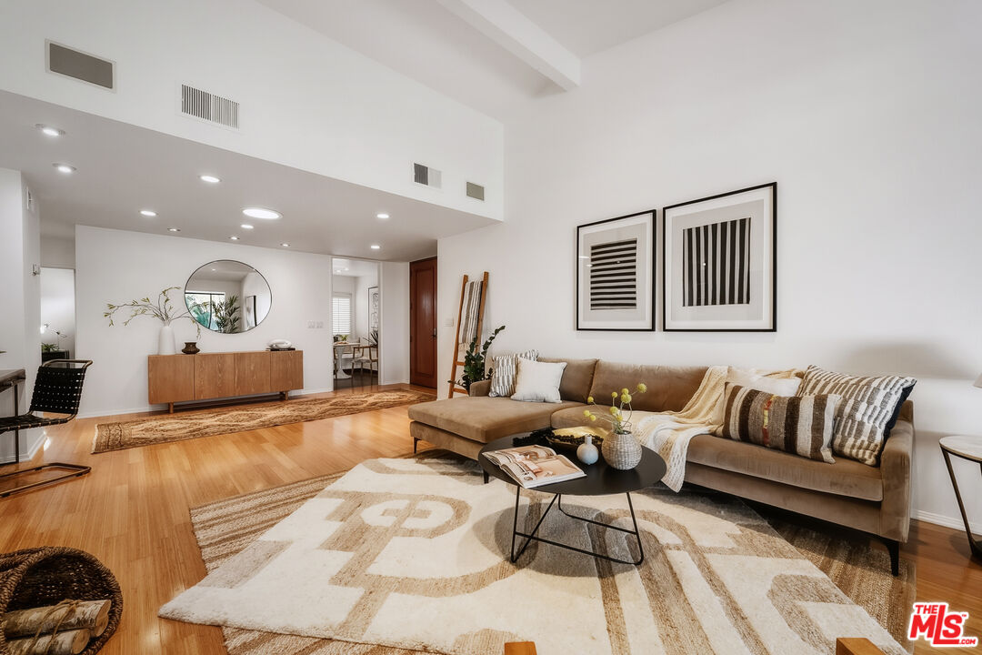 311 Bora Bora Way, Unit 315 Marina del Rey, CA 90292 - Photo 5 of 34 a living room with furniture and a couch