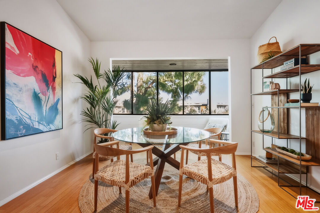 311 Bora Bora Way, Unit 315 Marina del Rey, CA 90292 - Photo 6 of 34 a dining room with furniture and window