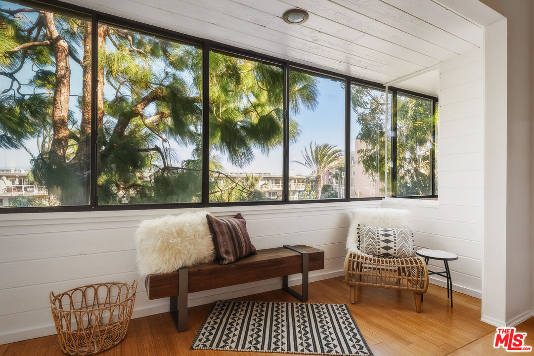 311 Bora Bora Way, Unit 315 Marina del Rey, CA 90292 - Photo 8 of 34 a living room with couch and a table