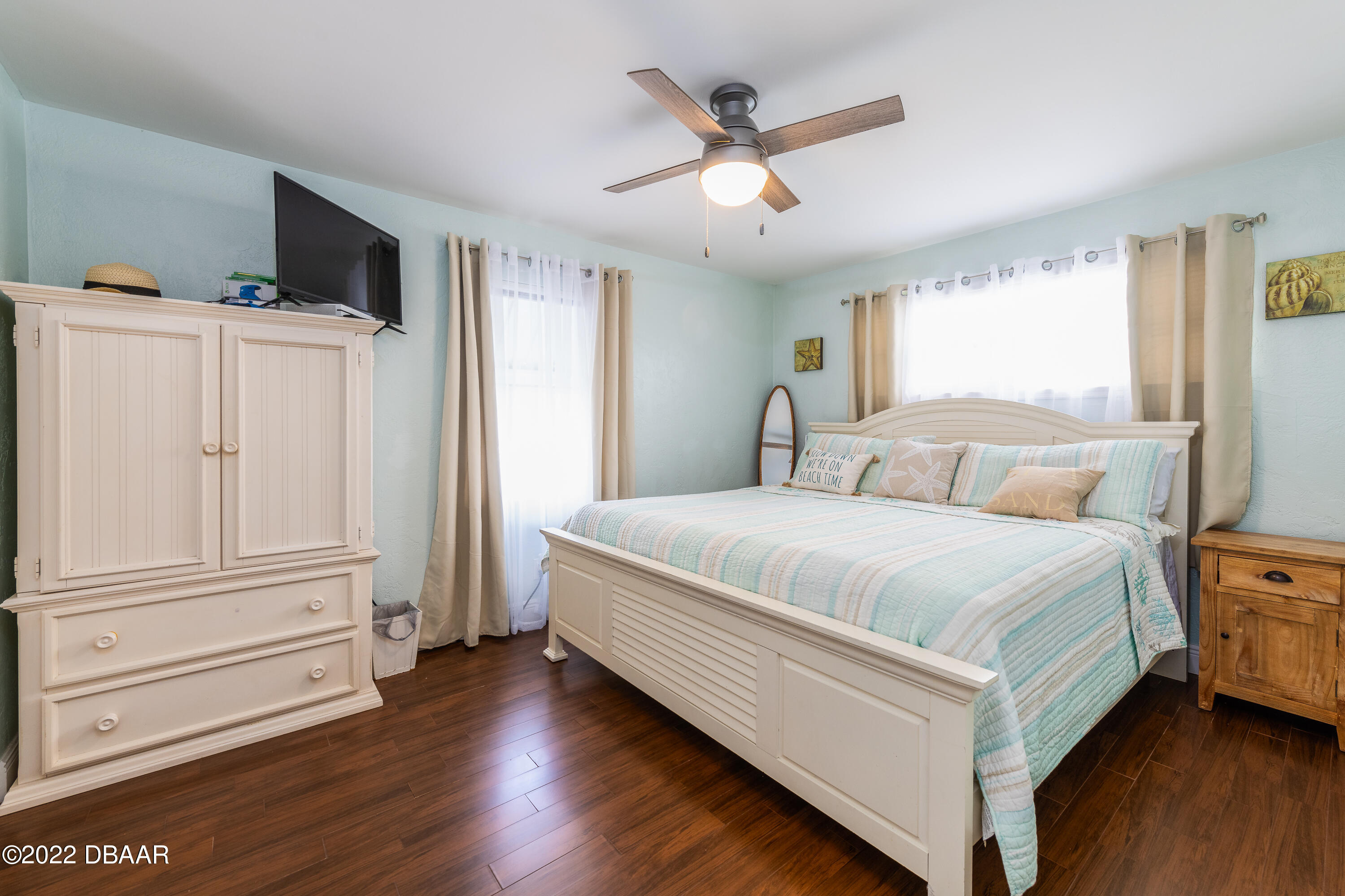 1253 Riverbreeze Boulevard Ormond Beach, FL 32176 - Photo 24 of 39 a bedroom with a large bed and a window