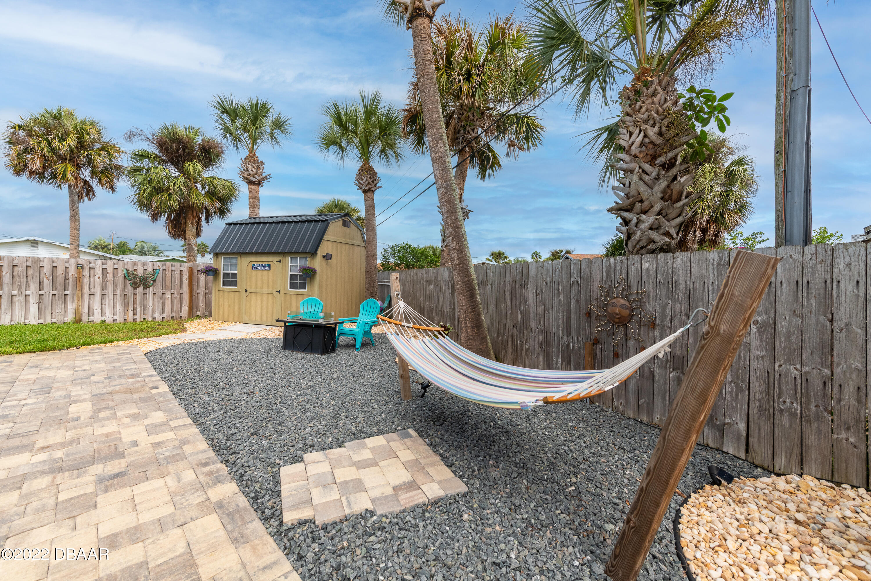 1253 Riverbreeze Boulevard Ormond Beach, FL 32176 - Photo 8 of 39 a house view with a garden space