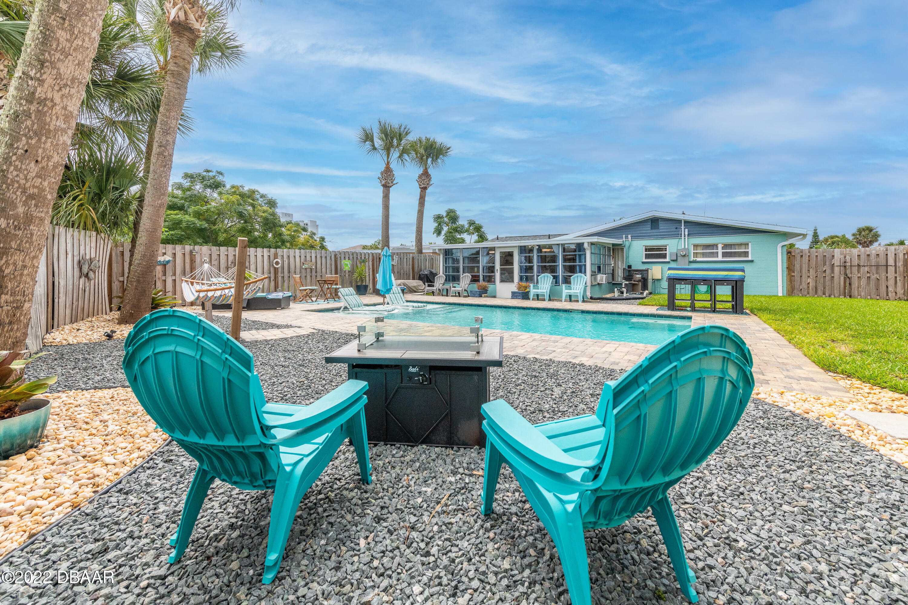 1253 Riverbreeze Boulevard Ormond Beach, FL 32176 - Photo 9 of 39 a view of swimming pool outdoor seating and city view