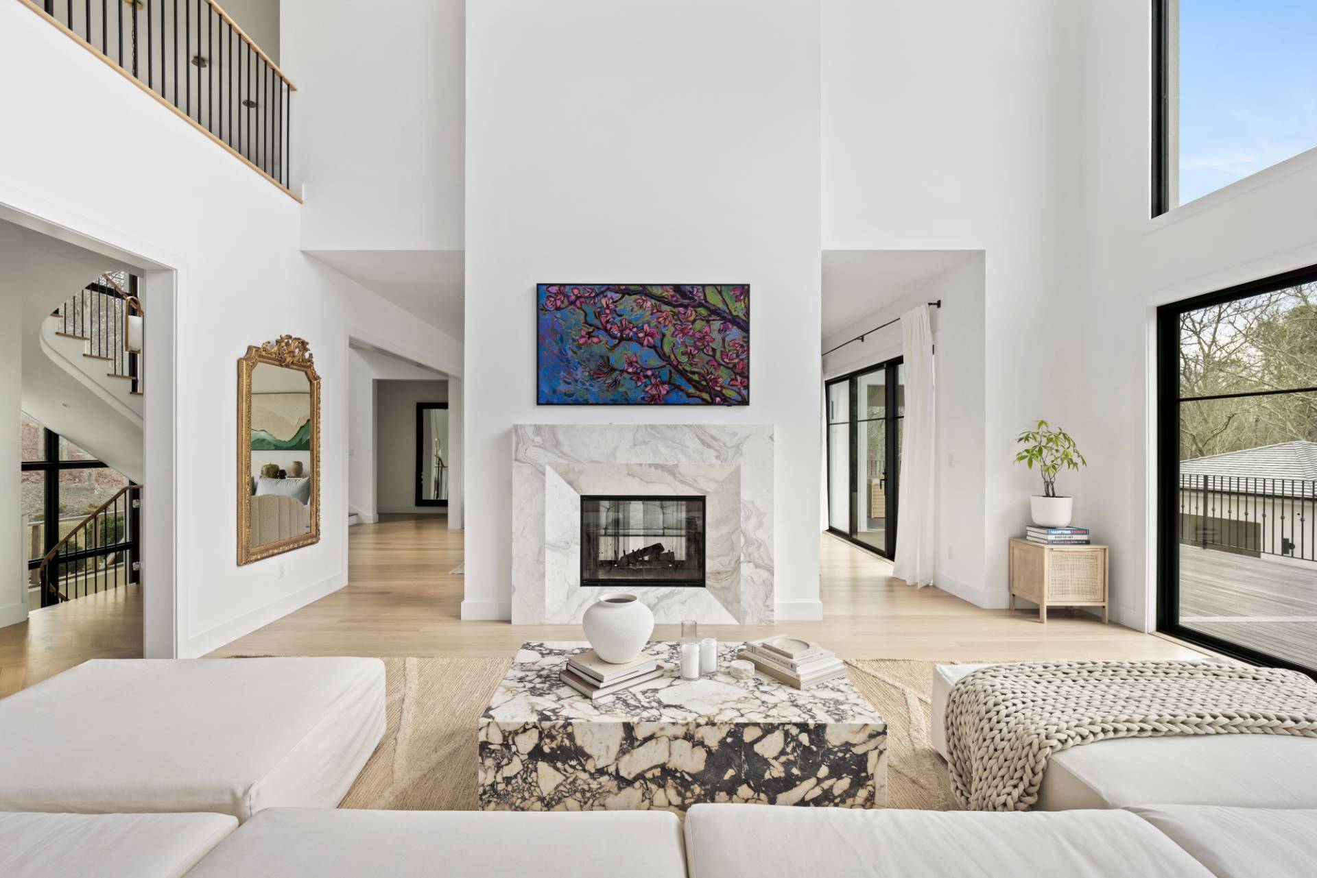 38 Chatfields Ridge Road East Hampton, NY 11937 - Photo 1 of 27 a living room with furniture a fireplace and a flat screen tv