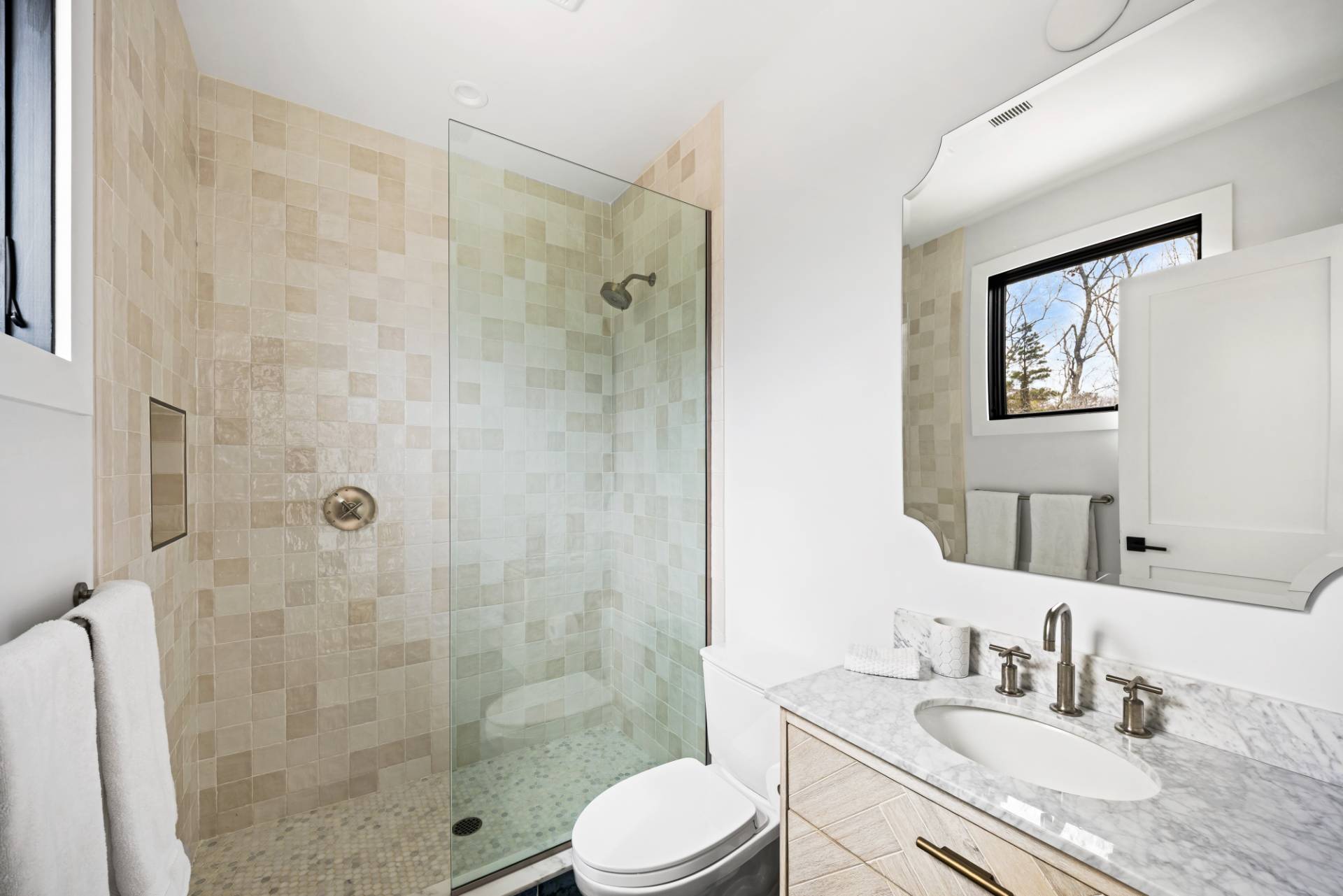 38 Chatfields Ridge Road East Hampton, NY 11937 - Photo 18 of 27 a bathroom with a granite countertop sink toilet and shower