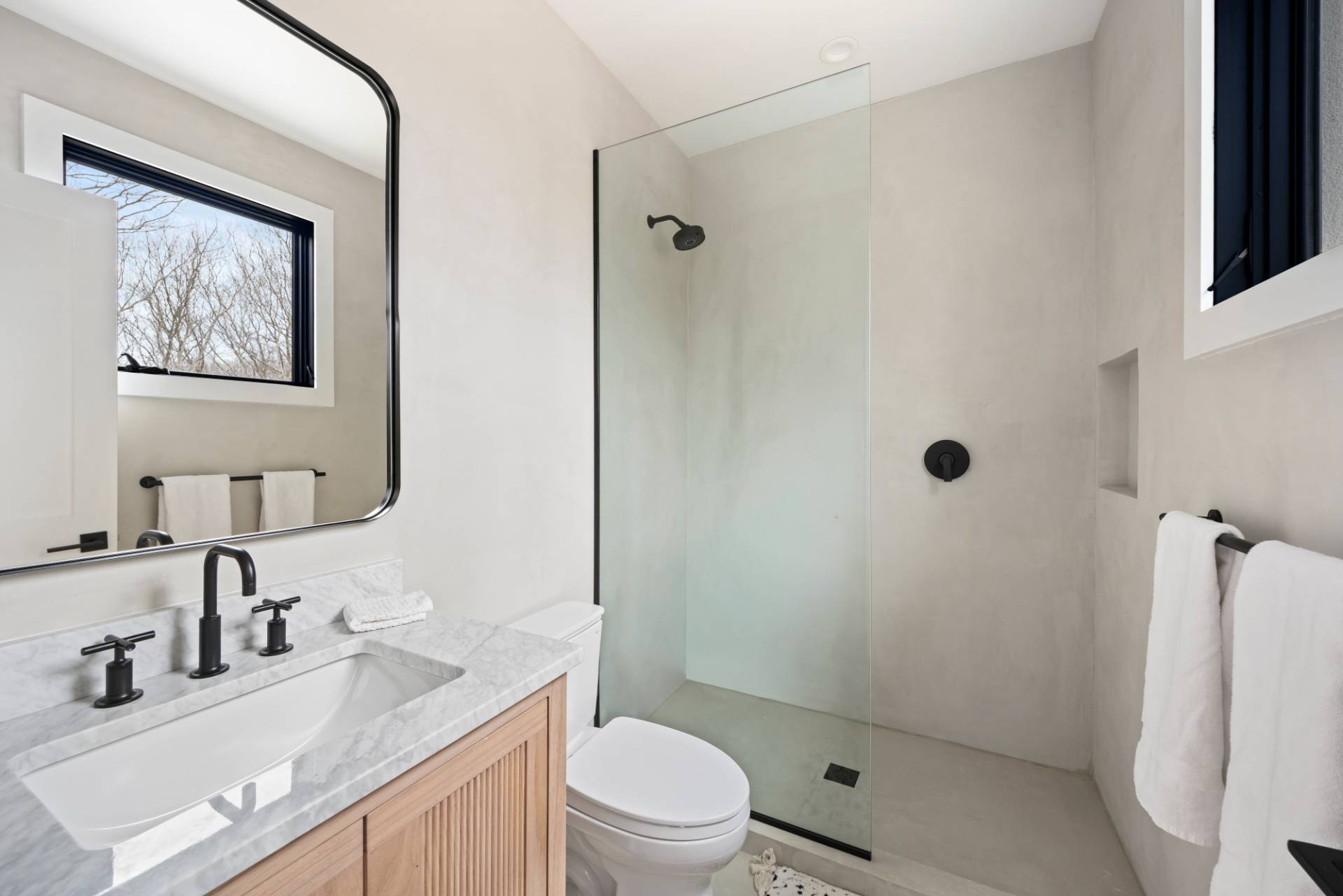 38 Chatfields Ridge Road East Hampton, NY 11937 - Photo 20 of 27 a bathroom with a sink a toilet and shower