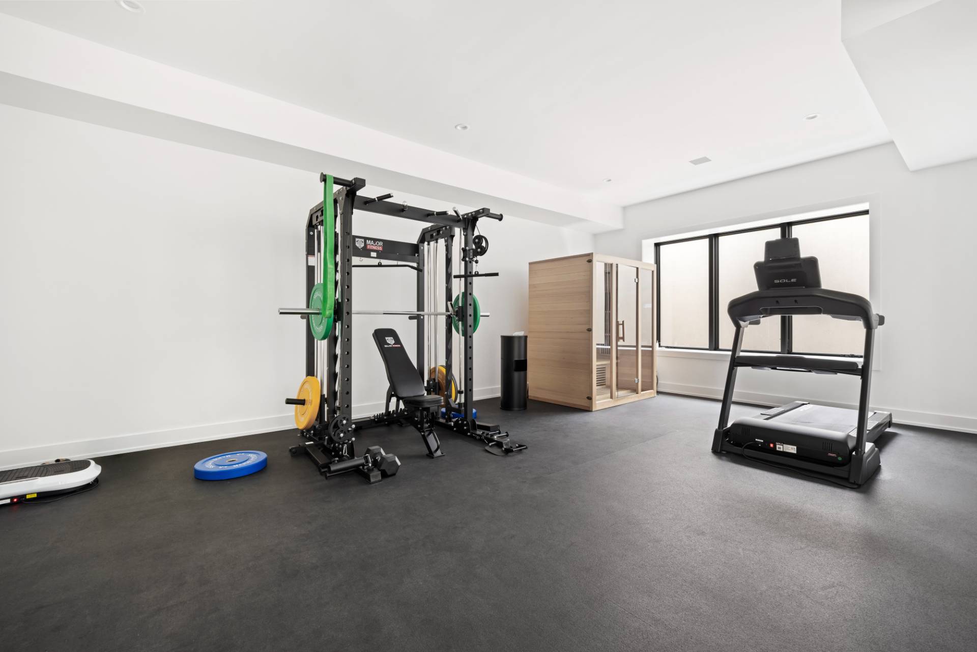 38 Chatfields Ridge Road East Hampton, NY 11937 - Photo 23 of 27 a view of a room with gym equipment
