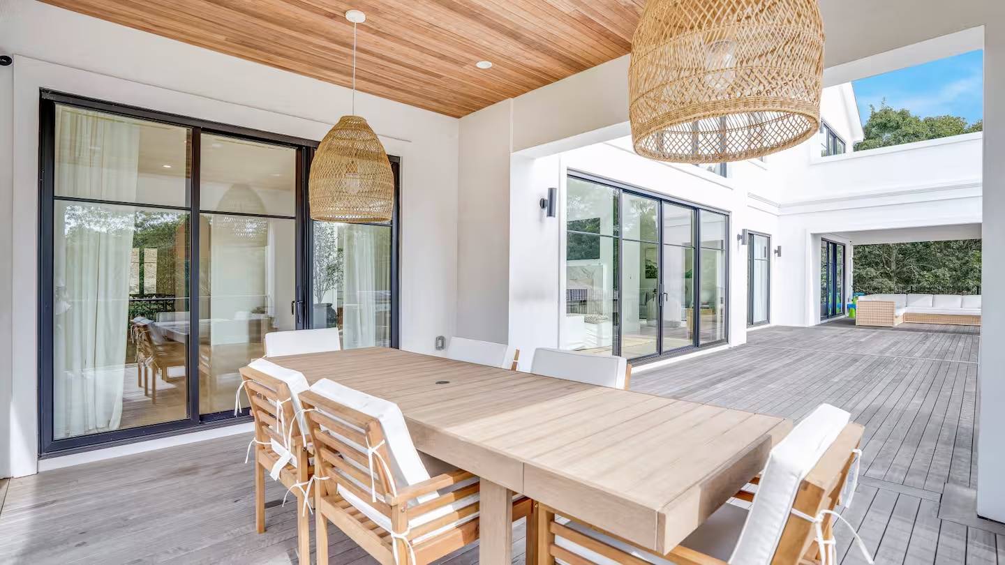 38 Chatfields Ridge Road East Hampton, NY 11937 - Photo 24 of 27 a view of a dining room with furniture wooden floor and chandelier