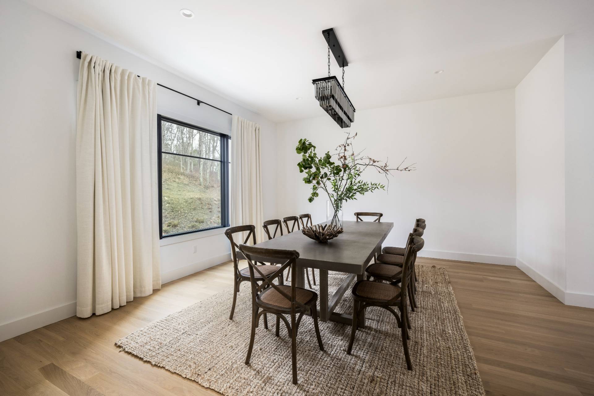 38 Chatfields Ridge Road East Hampton, NY 11937 - Photo 7 of 27 a view of a dining room with furniture and wooden floor