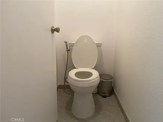 a bathroom with a toilet and a sink