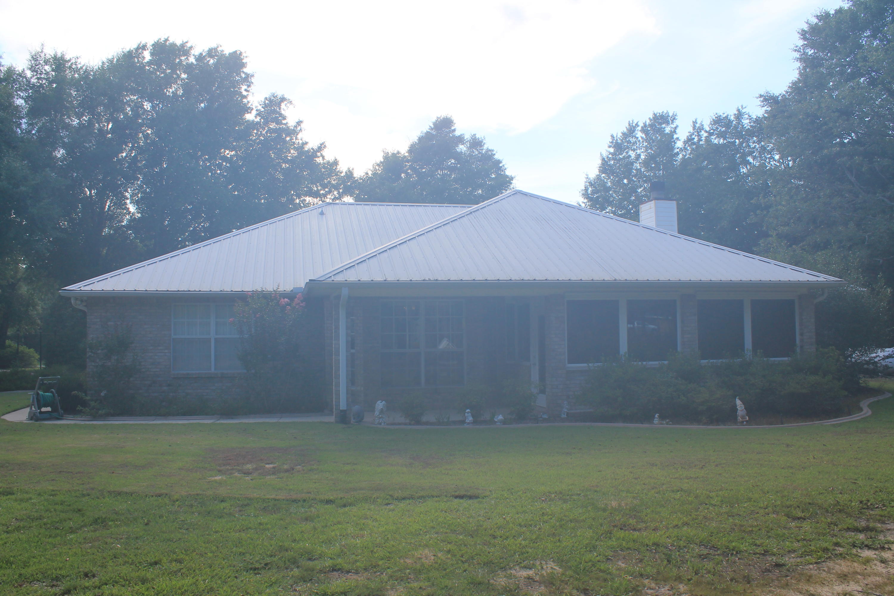 5876 Ward Ranch Road Crestview, FL 32536 - Photo 11 of 50 a house with a yard