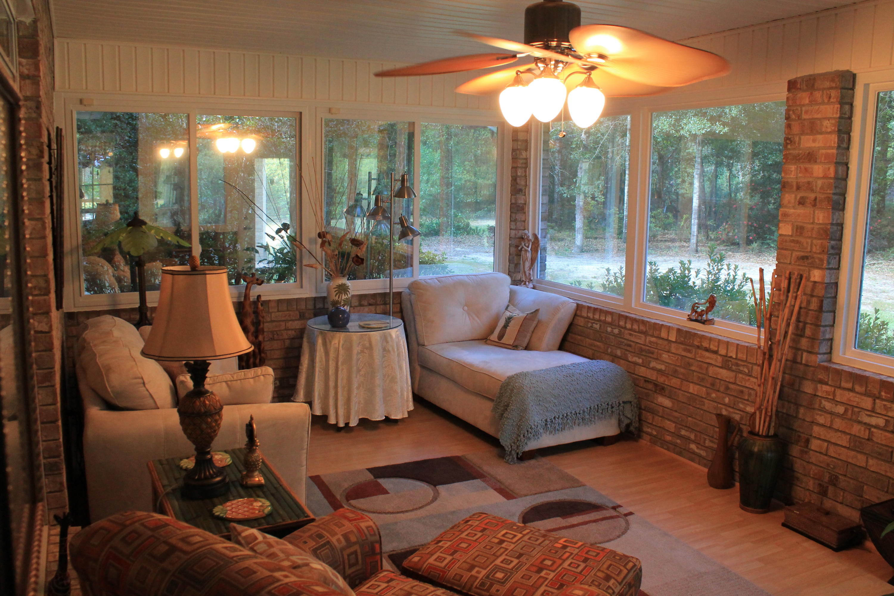 5876 Ward Ranch Road Crestview, FL 32536 - Photo 23 of 50 a living room with furniture and a large window