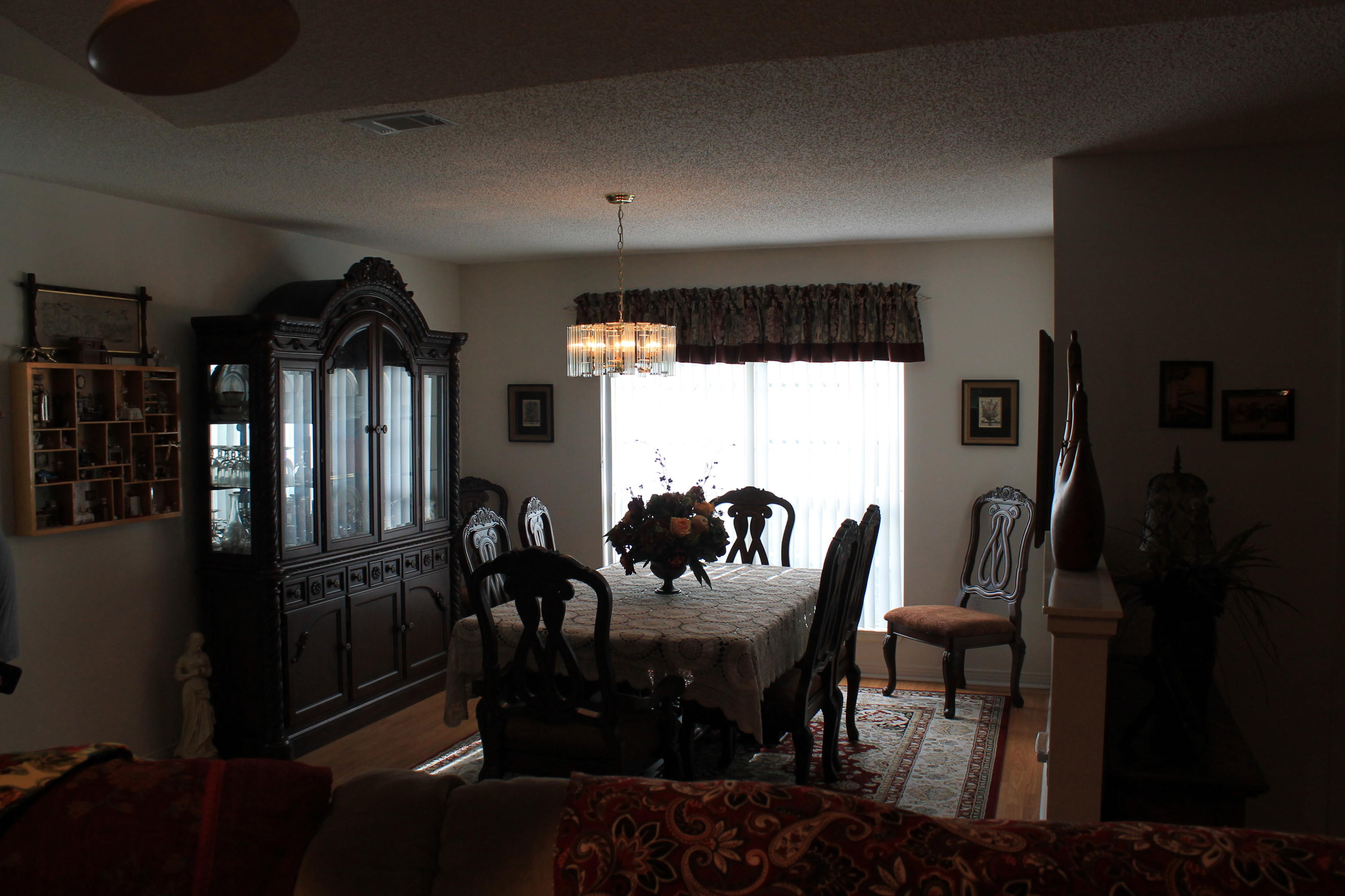 5876 Ward Ranch Road Crestview, FL 32536 - Photo 25 of 50 a view of a dining room with furniture window and wooden floor