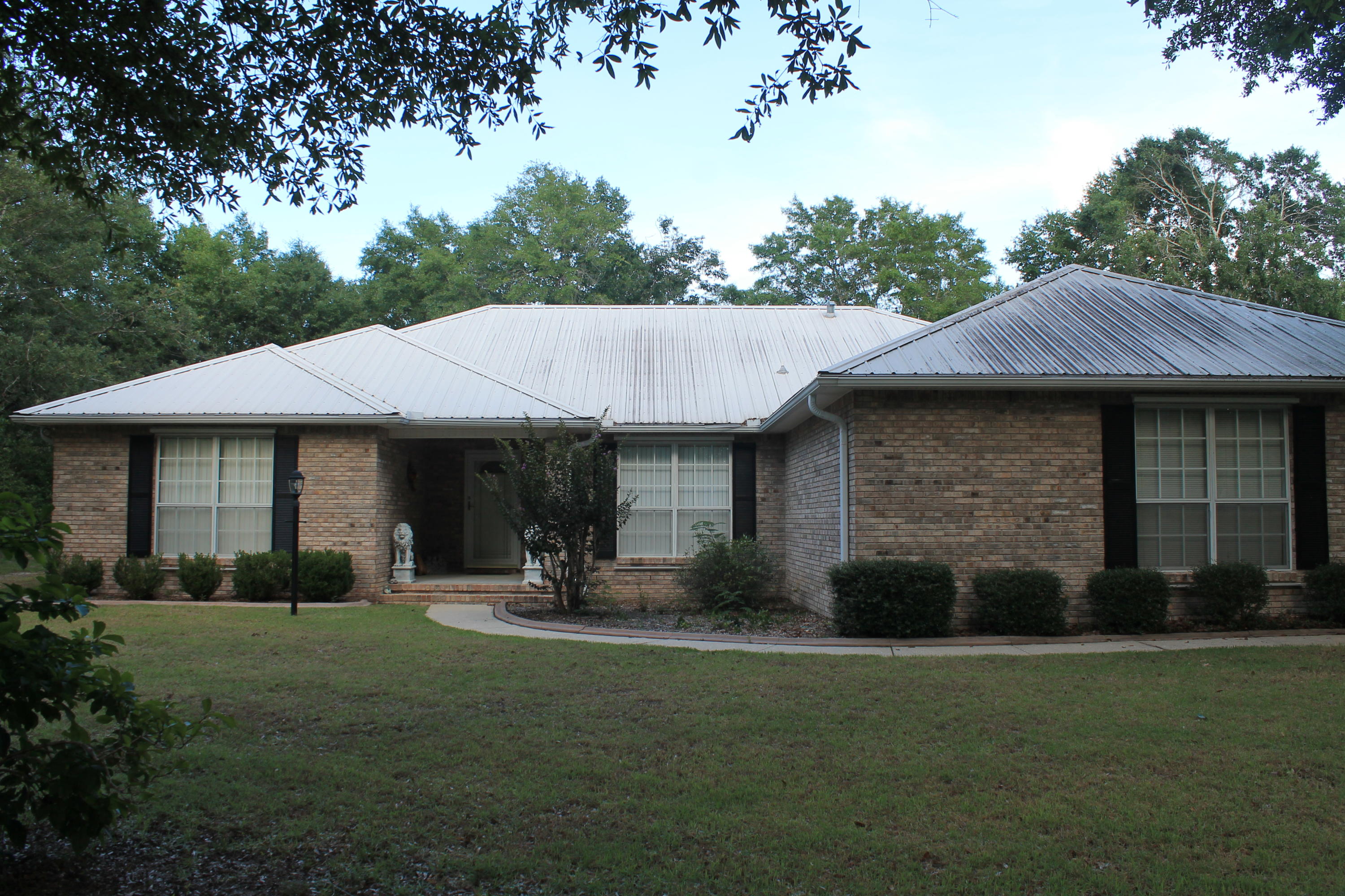 5876 Ward Ranch Road Crestview, FL 32536 - Photo 4 of 50 a view of a house with a yard