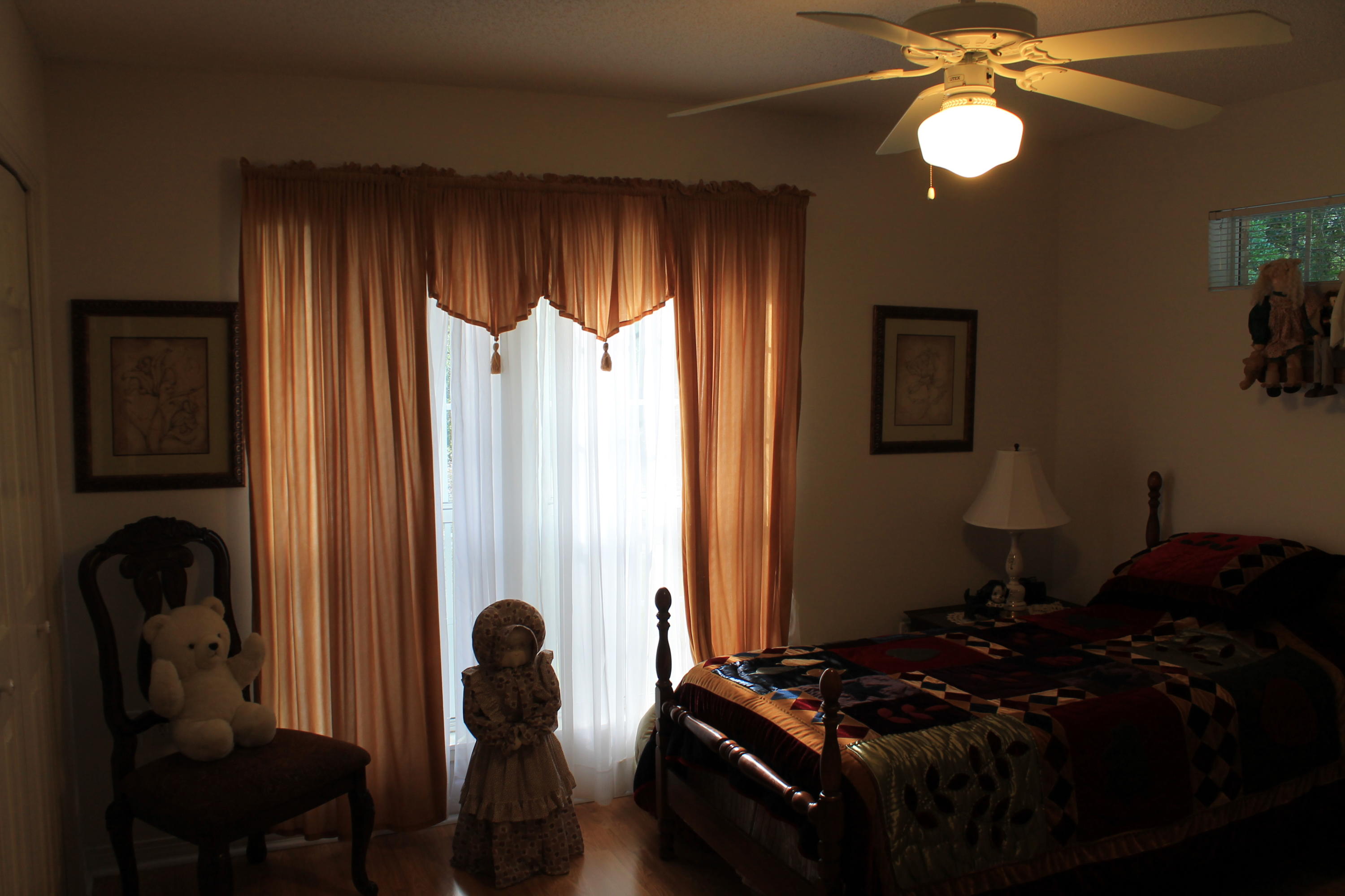 5876 Ward Ranch Road Crestview, FL 32536 - Photo 31 of 50 a bedroom with bed and a window