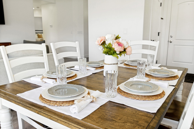 983 West 1550th Street South Springville, UT 84663 - Photo 18 of 43 Spacious dining area featuring a wood-finish table and white chairs.