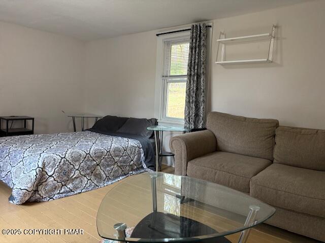 207 Munch Drive Henryville, PA 18332 - Photo 13 of 43 a living room with a couch and a table