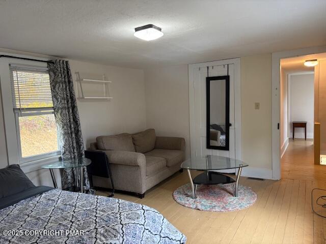 207 Munch Drive Henryville, PA 18332 - Photo 14 of 43 a living room with furniture and a window