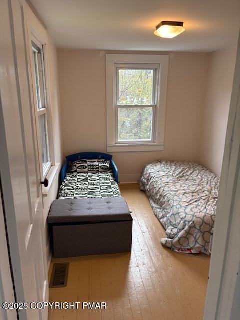 207 Munch Drive Henryville, PA 18332 - Photo 32 of 43 a bedroom with a bed and a window