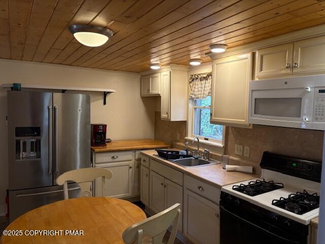 207 Munch Drive Henryville, PA 18332 - Photo 10 of 43 a kitchen that has a sink stainless steel appliances and cabinets