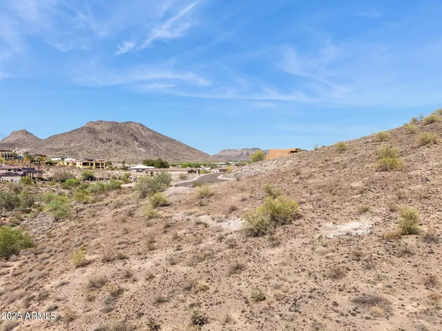 a view of mountain view with mountains in the background