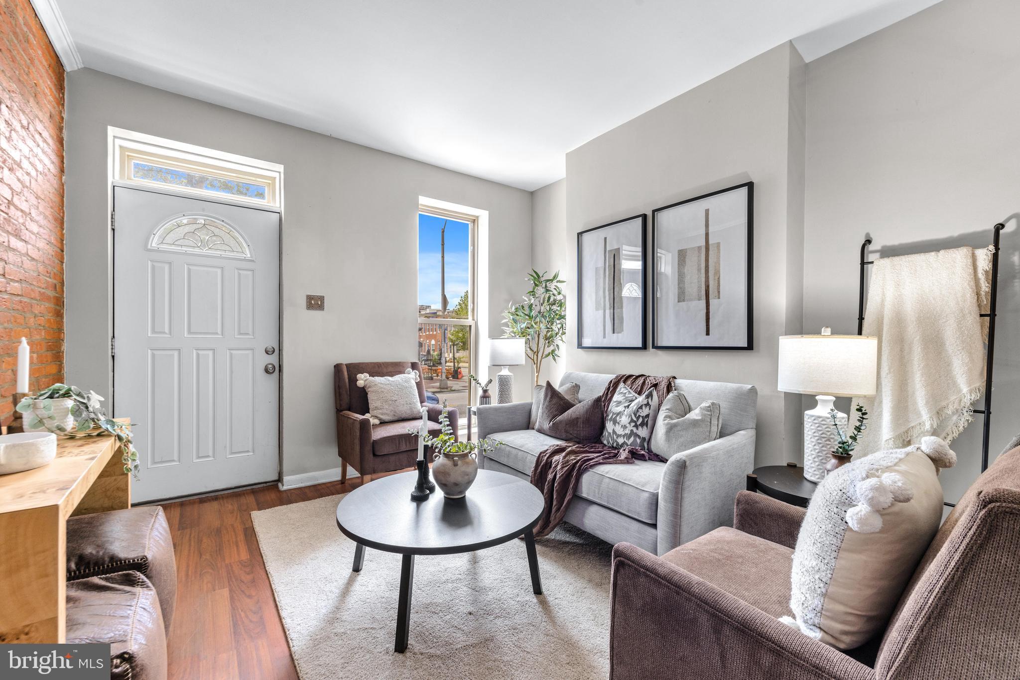 1505 South Hanover Street Baltimore, MD 21230 - Photo 2 of 30 a living room with furniture and a wooden floor