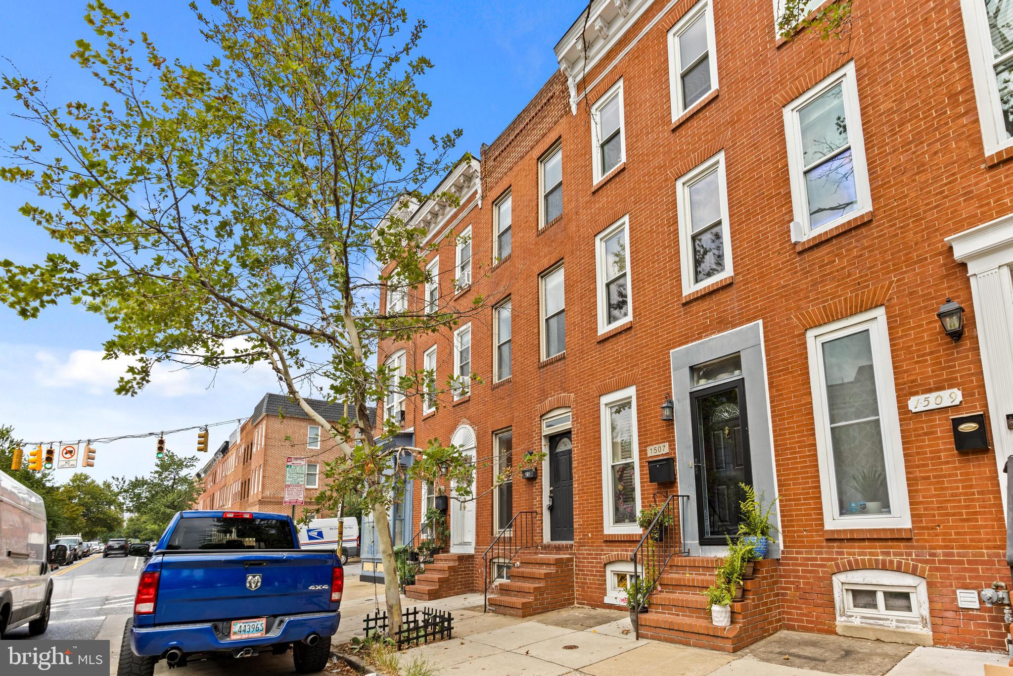1505 South Hanover Street Baltimore, MD 21230 - Photo 24 of 30 a front view of a building with a garden