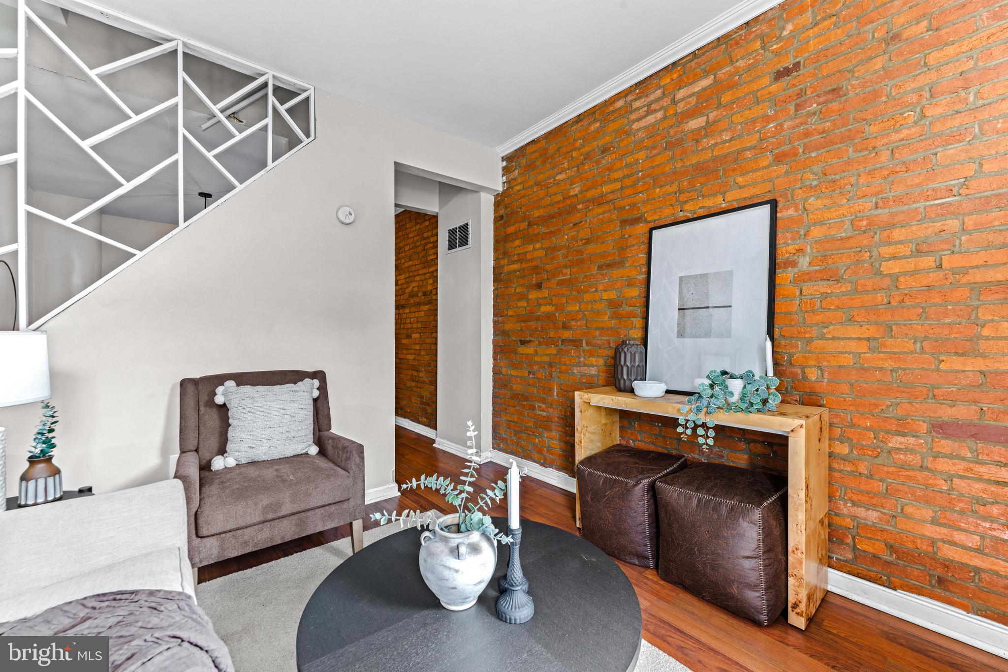 1505 South Hanover Street Baltimore, MD 21230 - Photo 3 of 30 a living room with furniture and a wooden floor