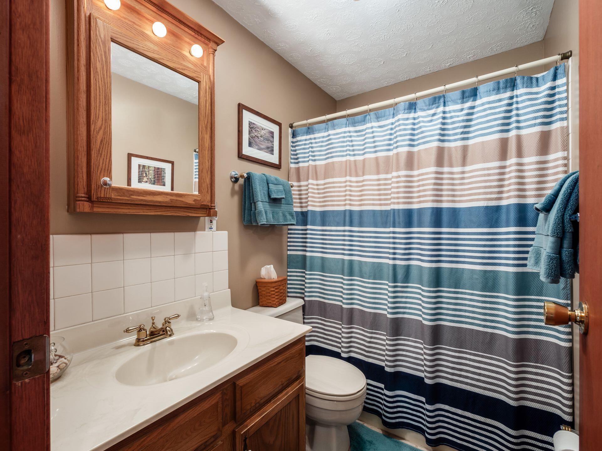 12741 Goodman Road Ashville, OH 43103 - Photo 18 of 61 The full hall bathroom includes a beautiful lighted medicine cabinet