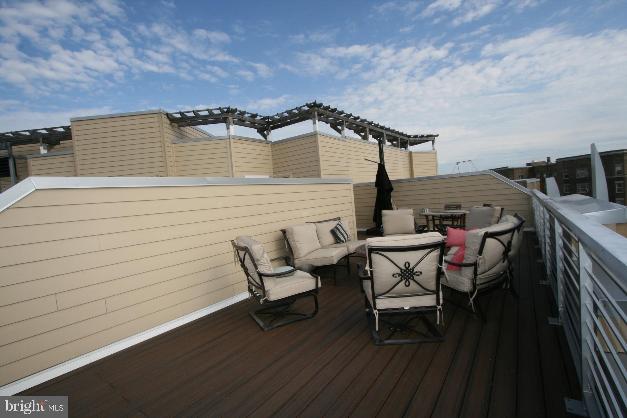 2550 17th Street Northwest, Unit 612 Washington, DC 20009 - Photo 34 of 55 a view of a terrace with chairs