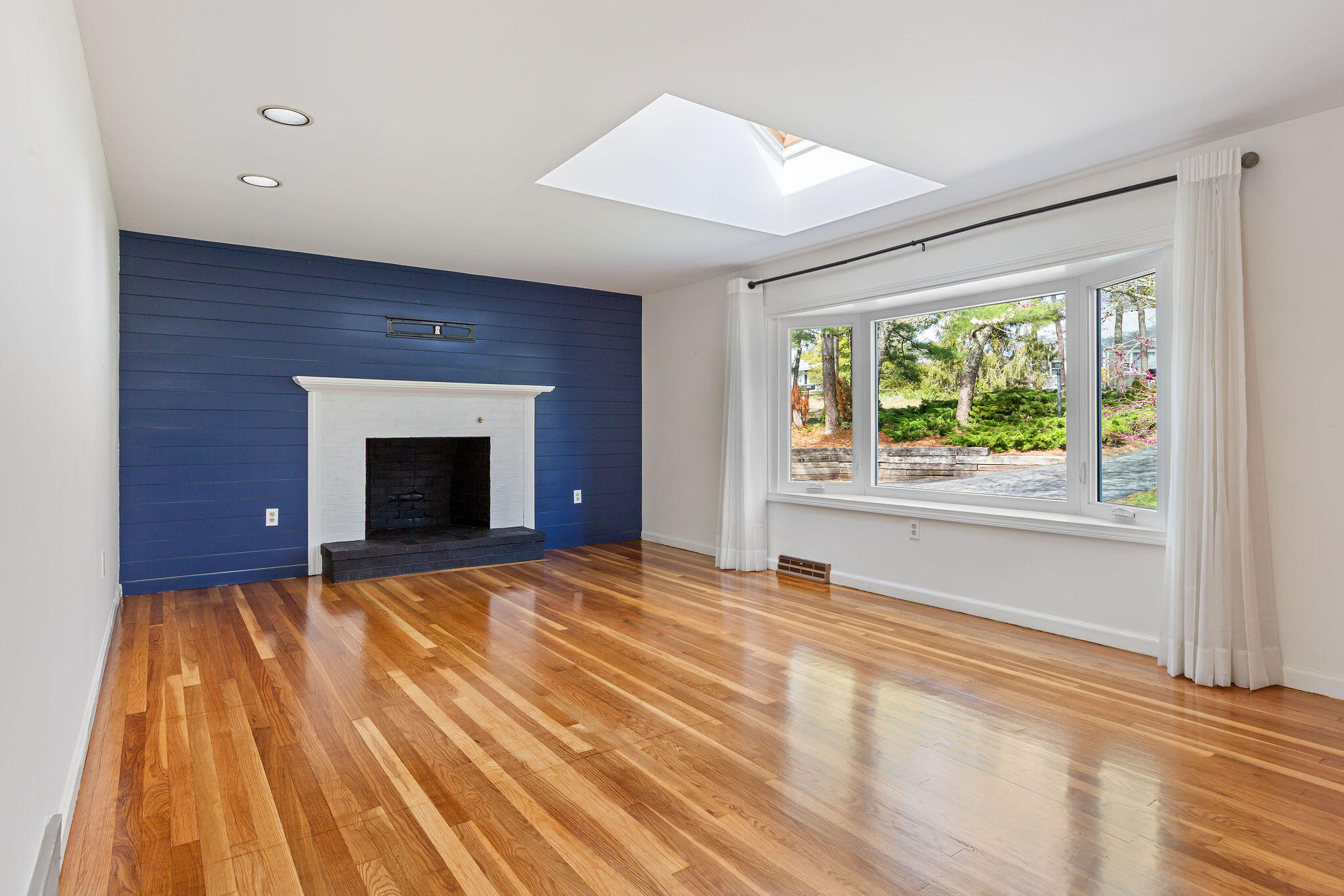 1197 Orleans-Harwich Road Harwich, MA 02645 - Photo 13 of 66 a view of an empty room with window and fire place