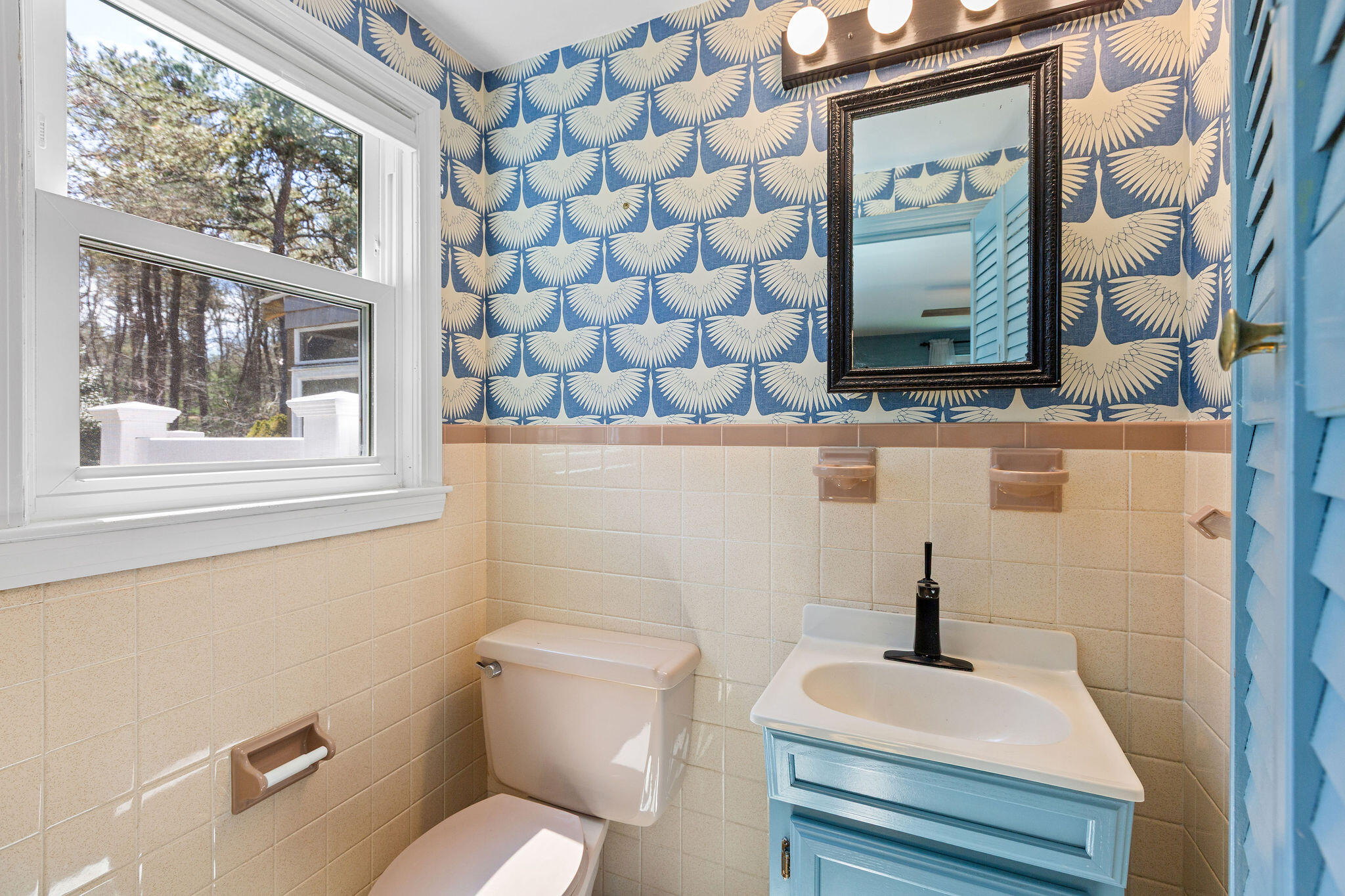 1197 Orleans-Harwich Road Harwich, MA 02645 - Photo 47 of 66 a bathroom with a toilet sink and mirror