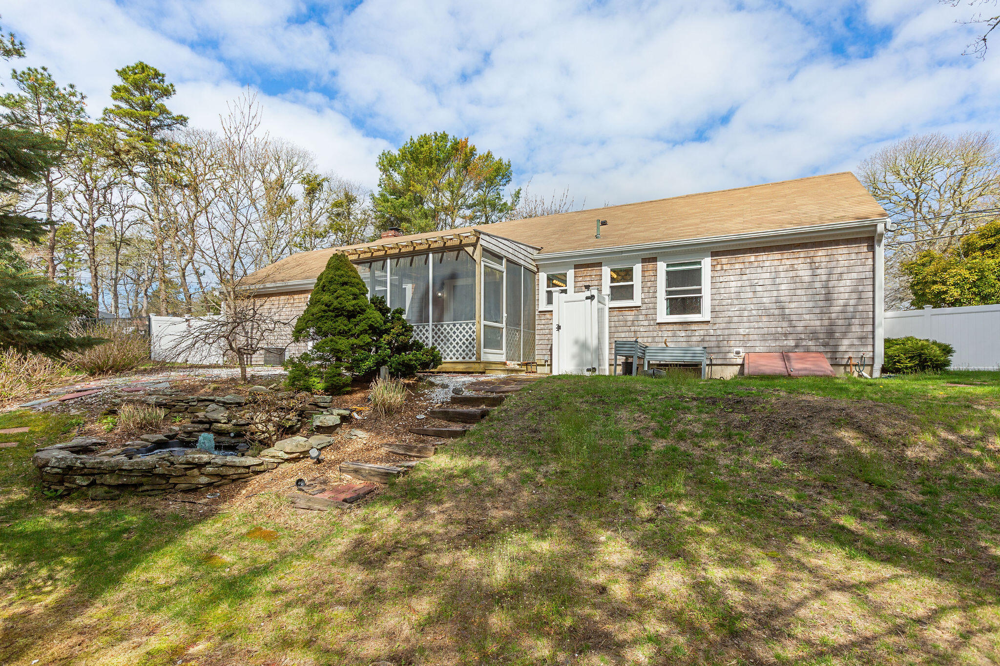 1197 Orleans-Harwich Road Harwich, MA 02645 - Photo 58 of 66 a front view of house with yard and green space