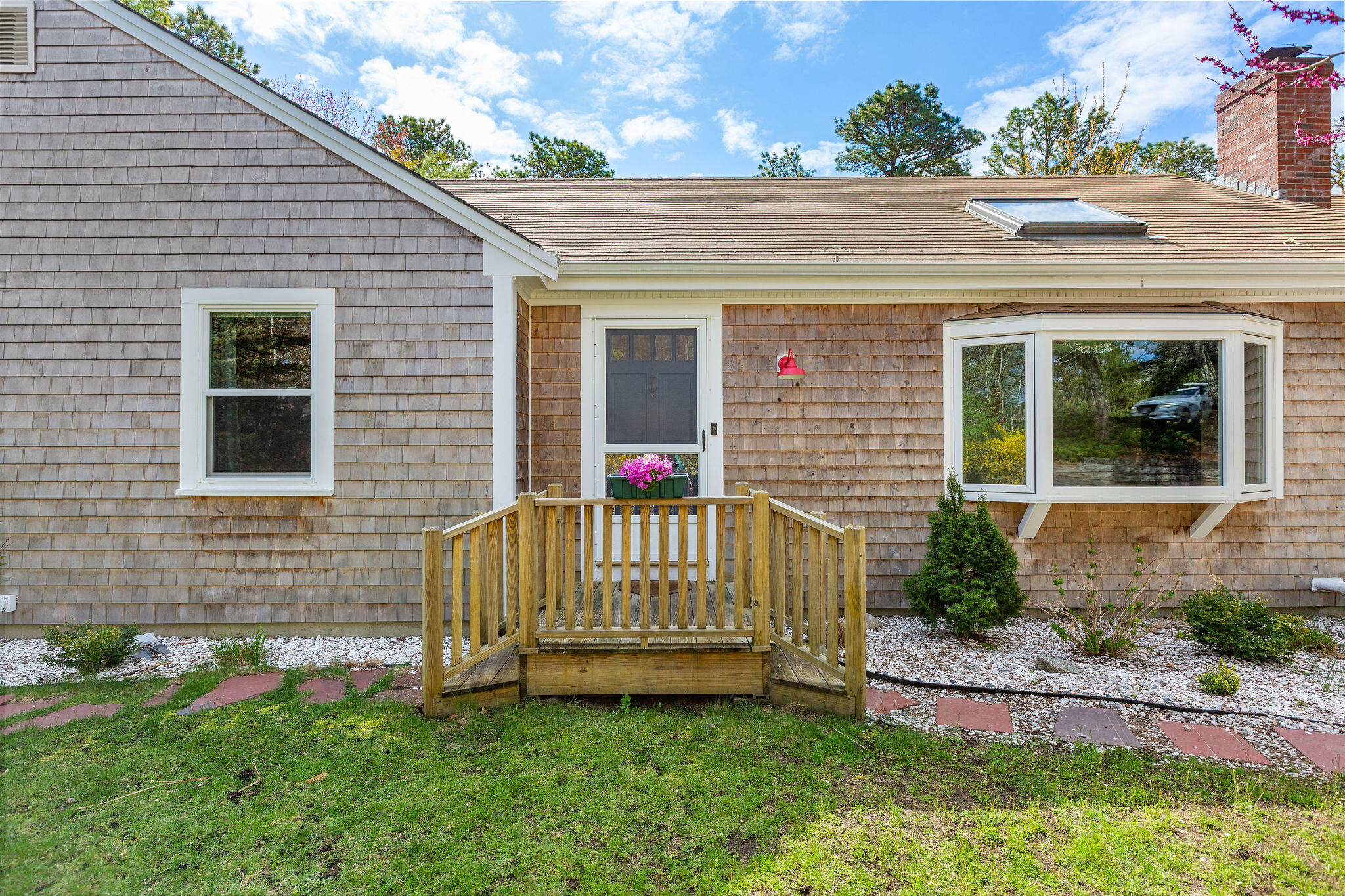 1197 Orleans-Harwich Road Harwich, MA 02645 - Photo 8 of 66 a view of a house with a yard and sitting area
