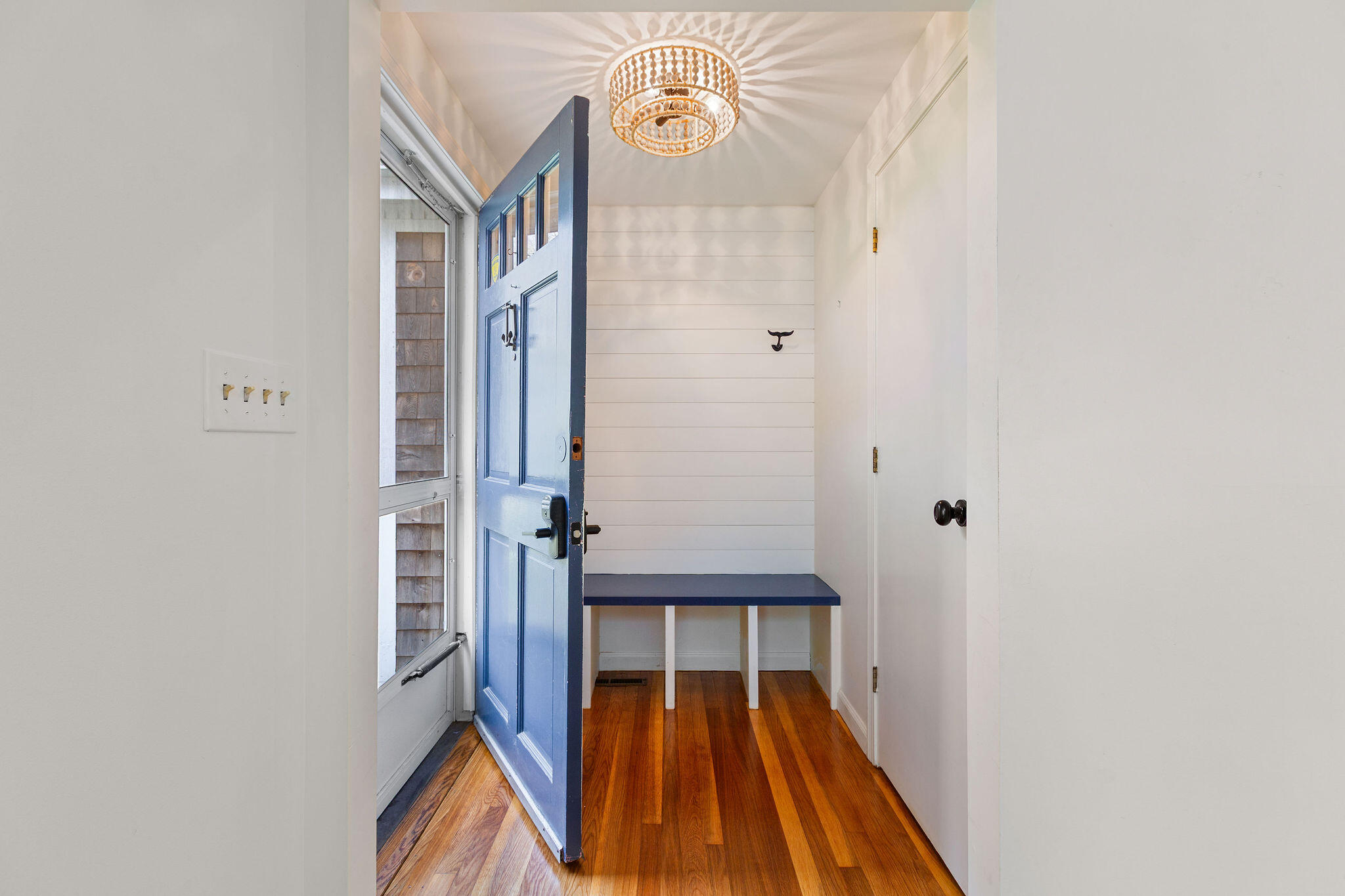 1197 Orleans-Harwich Road Harwich, MA 02645 - Photo 9 of 66 a view of a hallway with wooden floor